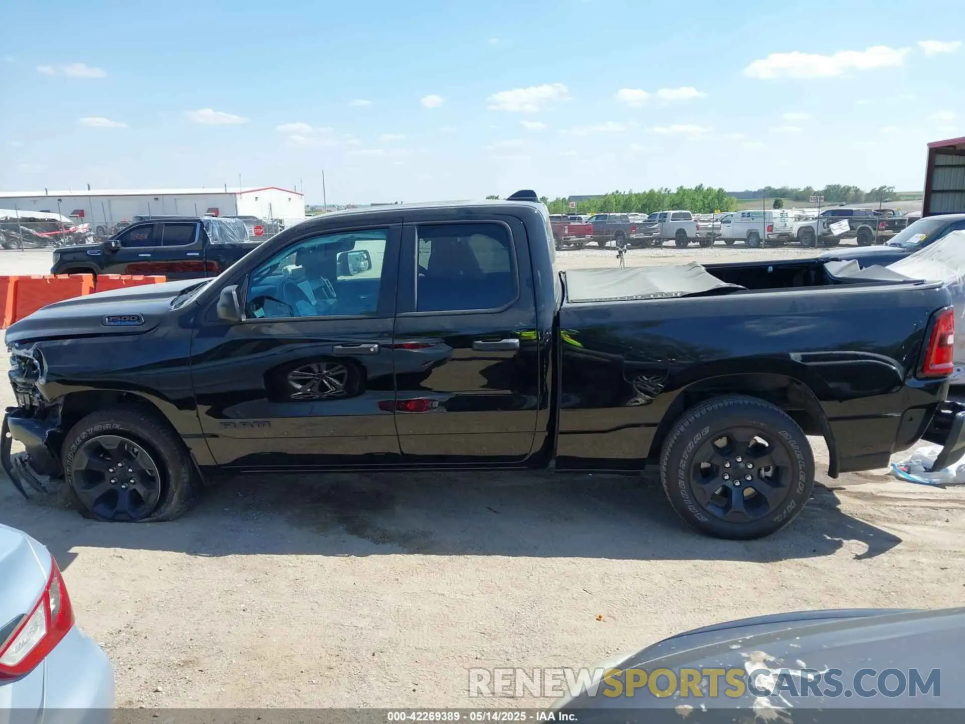 14 Photograph of a damaged car 1C6RRFCG4SN558262 RAM 1500 2025