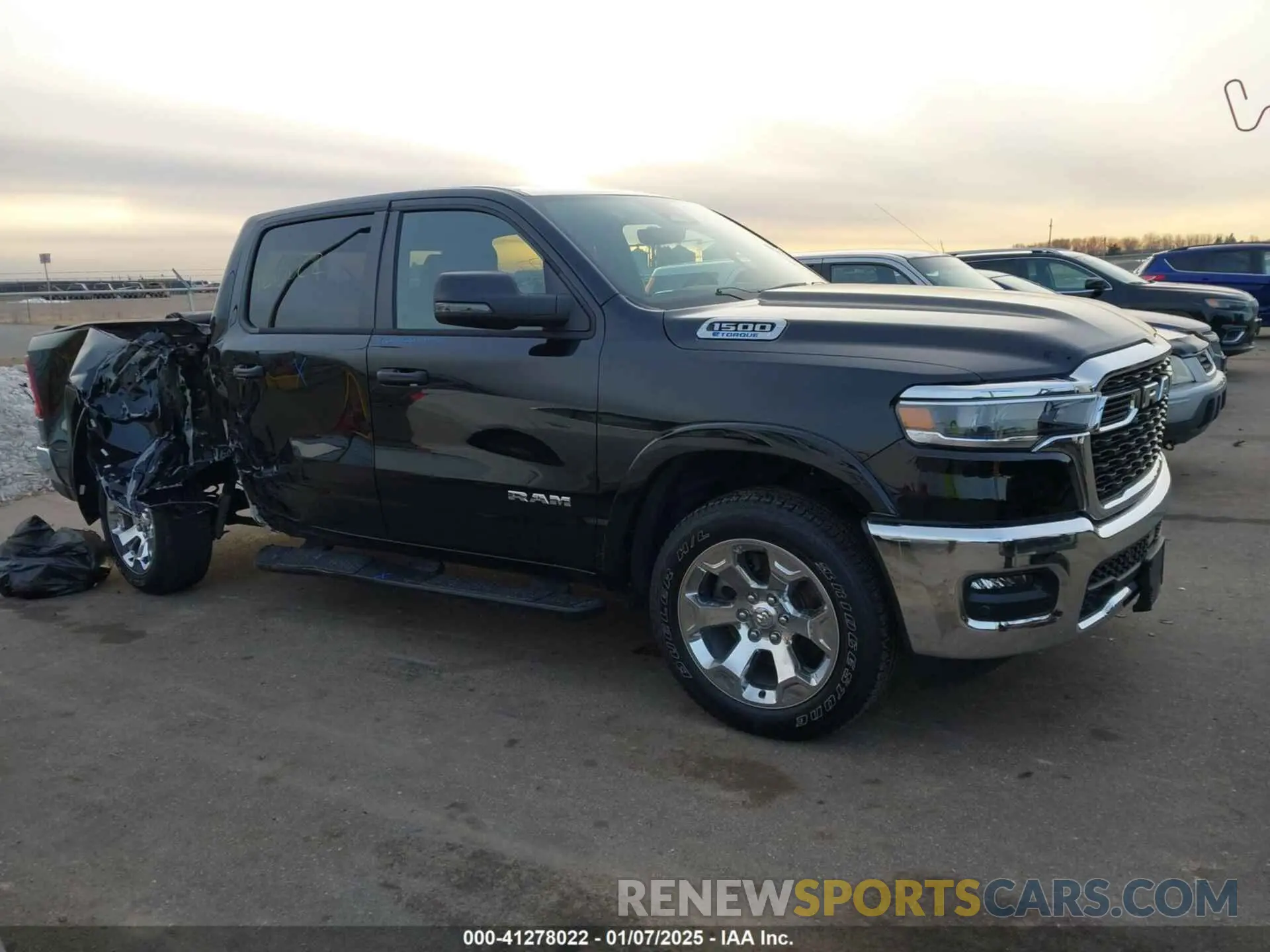 1 Photograph of a damaged car 1C6RRFFG6SN504120 RAM 1500 2025