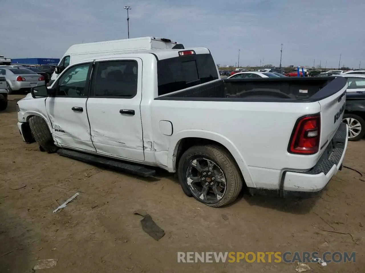2 Photograph of a damaged car 1C6RRFFG9SN589647 RAM 1500 2025