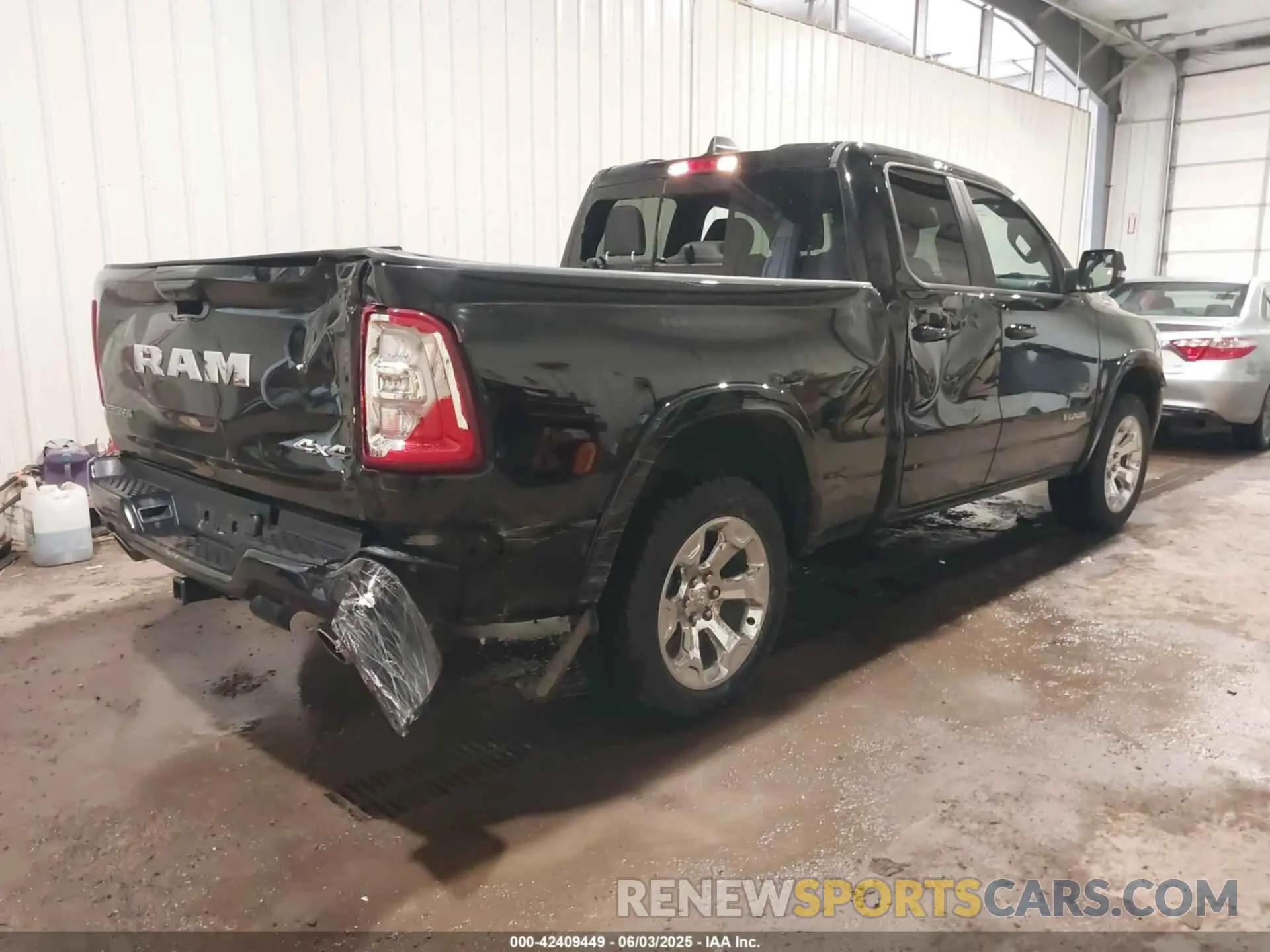 4 Photograph of a damaged car 1C6SRFBP9SN502384 RAM 1500 2025