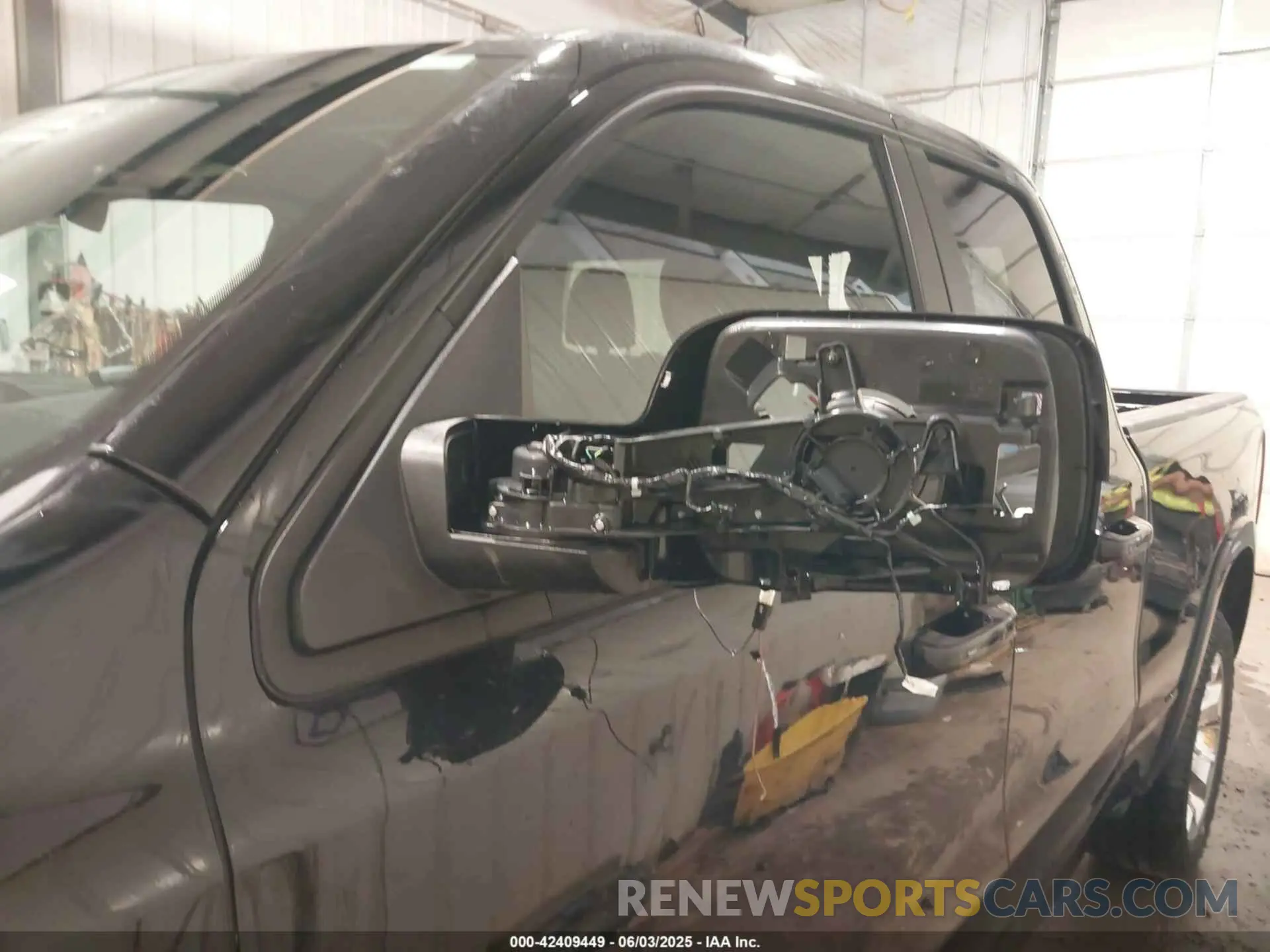 6 Photograph of a damaged car 1C6SRFBP9SN502384 RAM 1500 2025