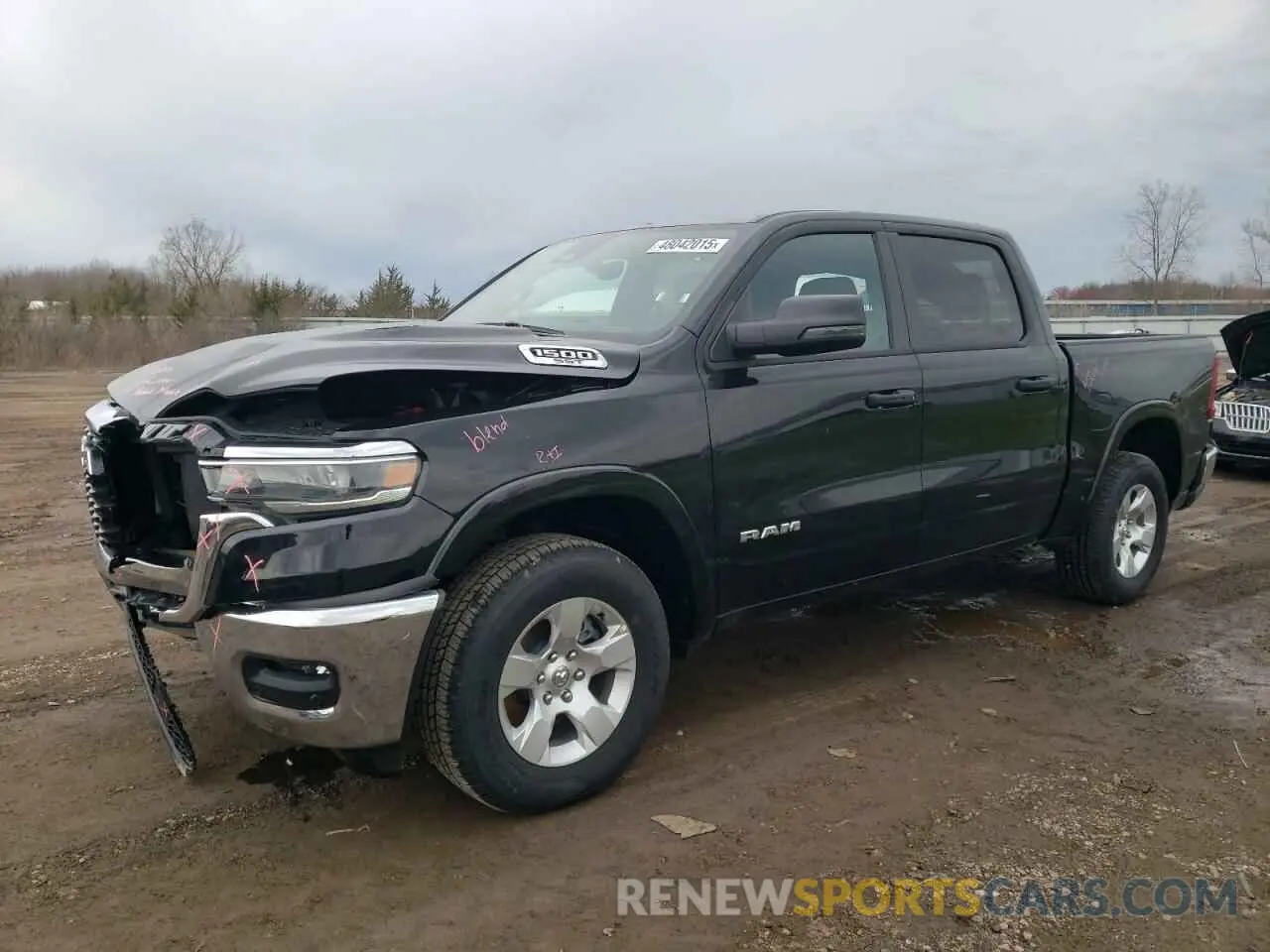 1 Photograph of a damaged car 1C6SRFFP0SN559311 RAM 1500 2025