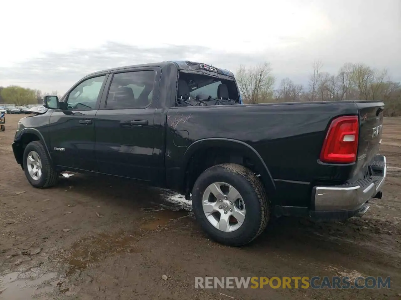 2 Photograph of a damaged car 1C6SRFFP0SN559311 RAM 1500 2025