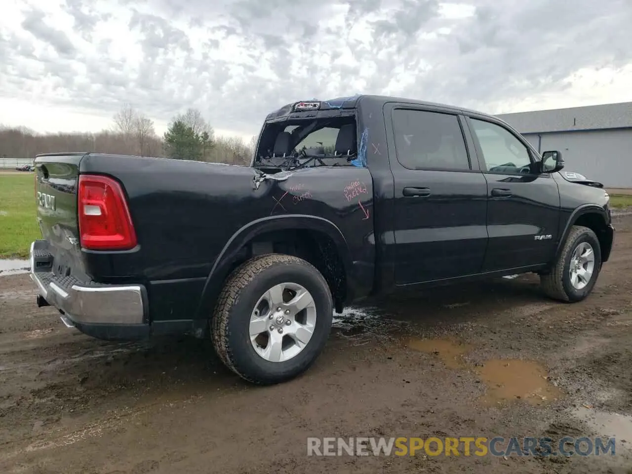3 Photograph of a damaged car 1C6SRFFP0SN559311 RAM 1500 2025