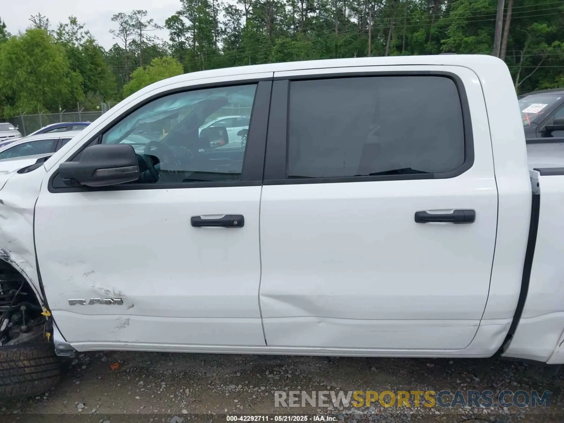 14 Photograph of a damaged car 1C6SRFFP0SN562192 RAM 1500 2025