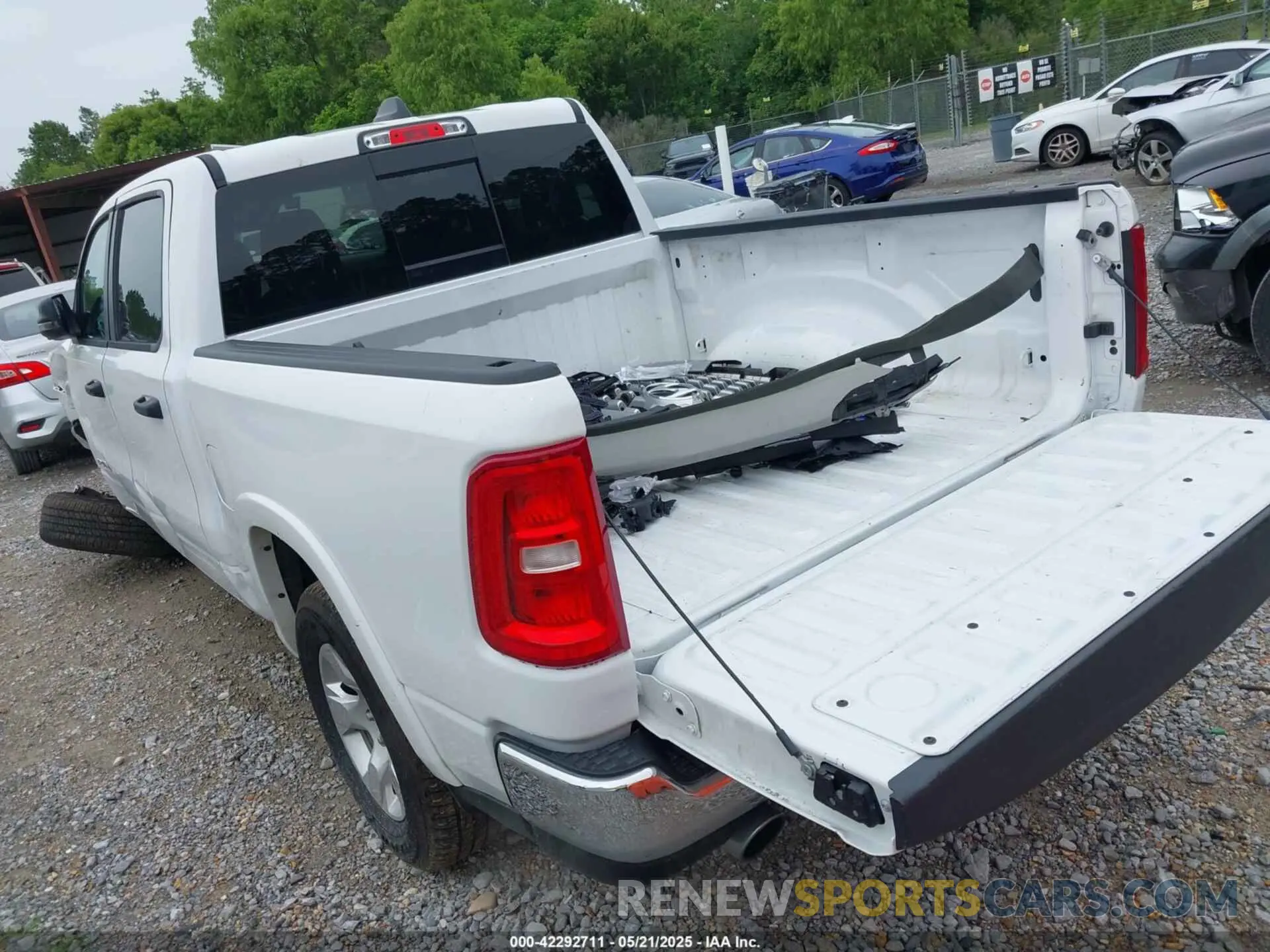 3 Photograph of a damaged car 1C6SRFFP0SN562192 RAM 1500 2025