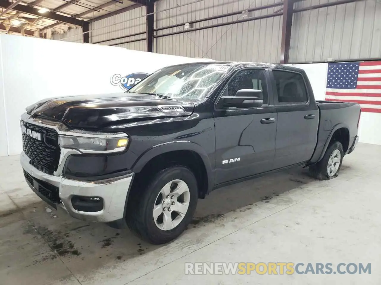 1 Photograph of a damaged car 1C6SRFFP1SN584251 RAM 1500 2025