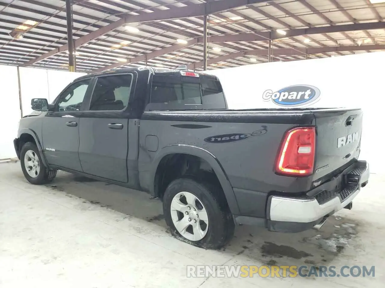 2 Photograph of a damaged car 1C6SRFFP1SN584251 RAM 1500 2025