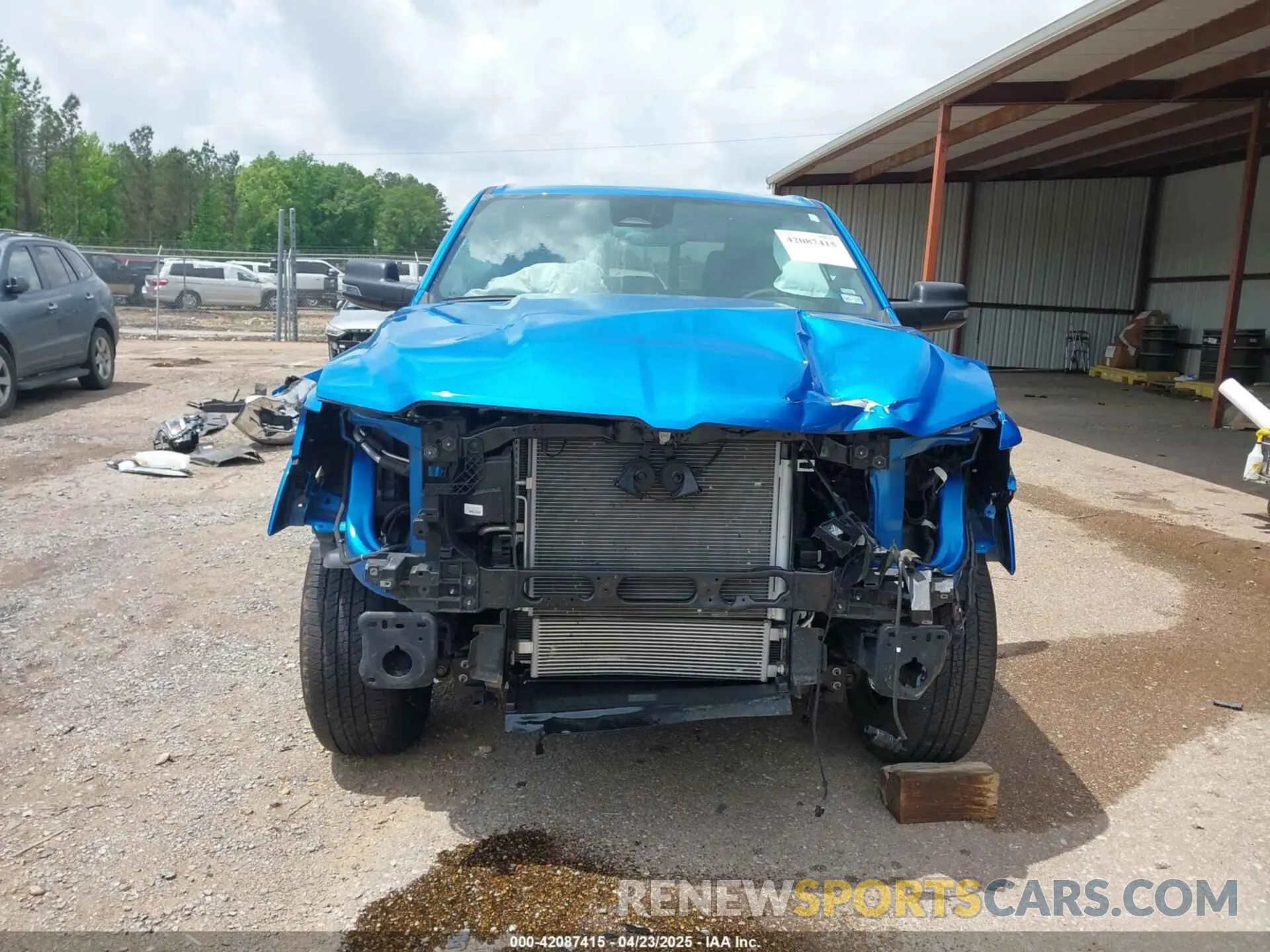 13 Photograph of a damaged car 1C6SRFFP2SN562047 RAM 1500 2025
