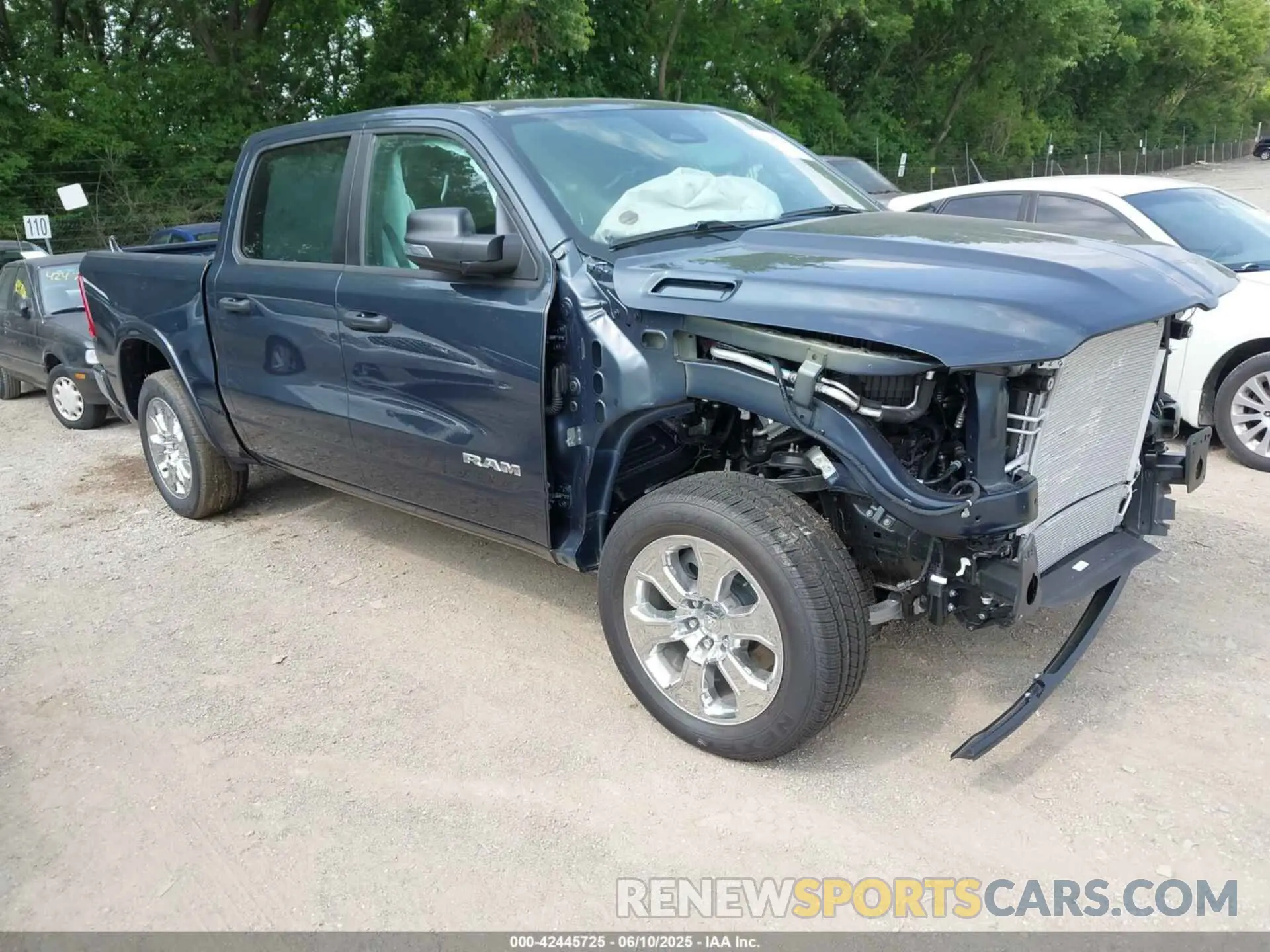1 Photograph of a damaged car 1C6SRFFP2SN715400 RAM 1500 2025
