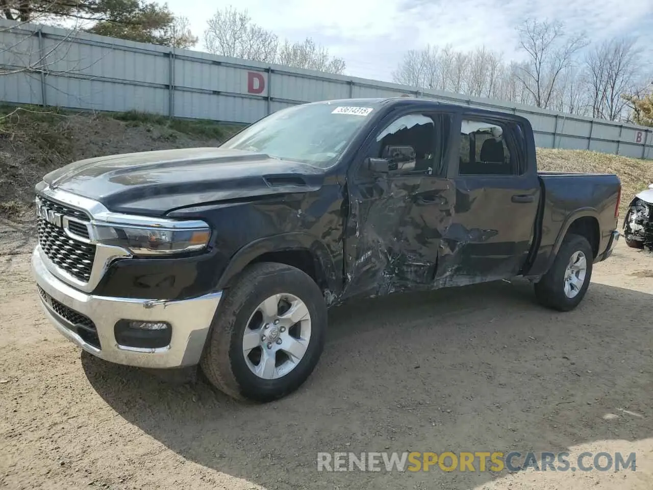 1 Photograph of a damaged car 1C6SRFFP3SN584185 RAM 1500 2025