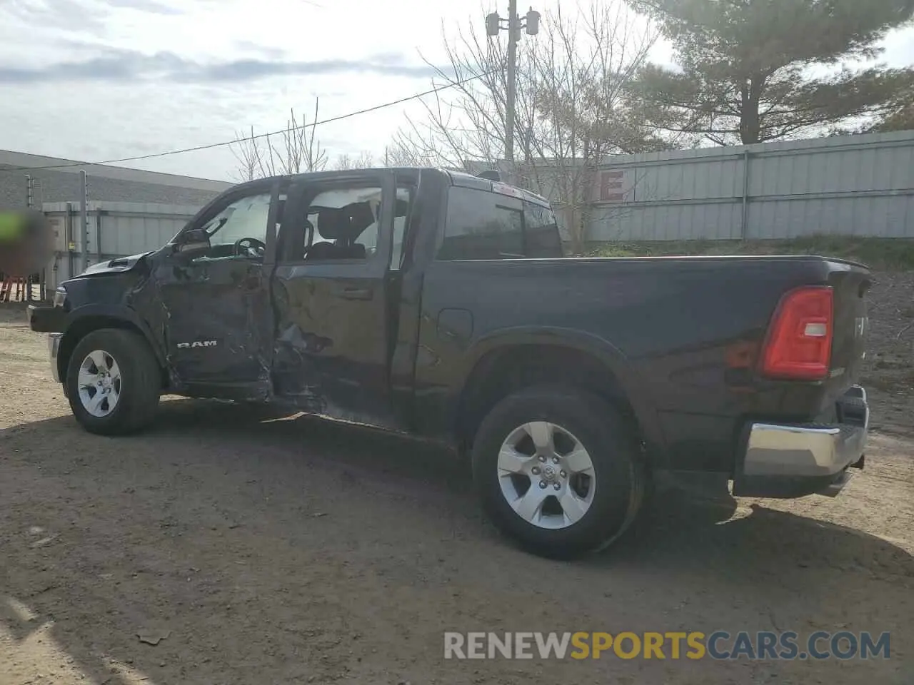 2 Photograph of a damaged car 1C6SRFFP3SN584185 RAM 1500 2025