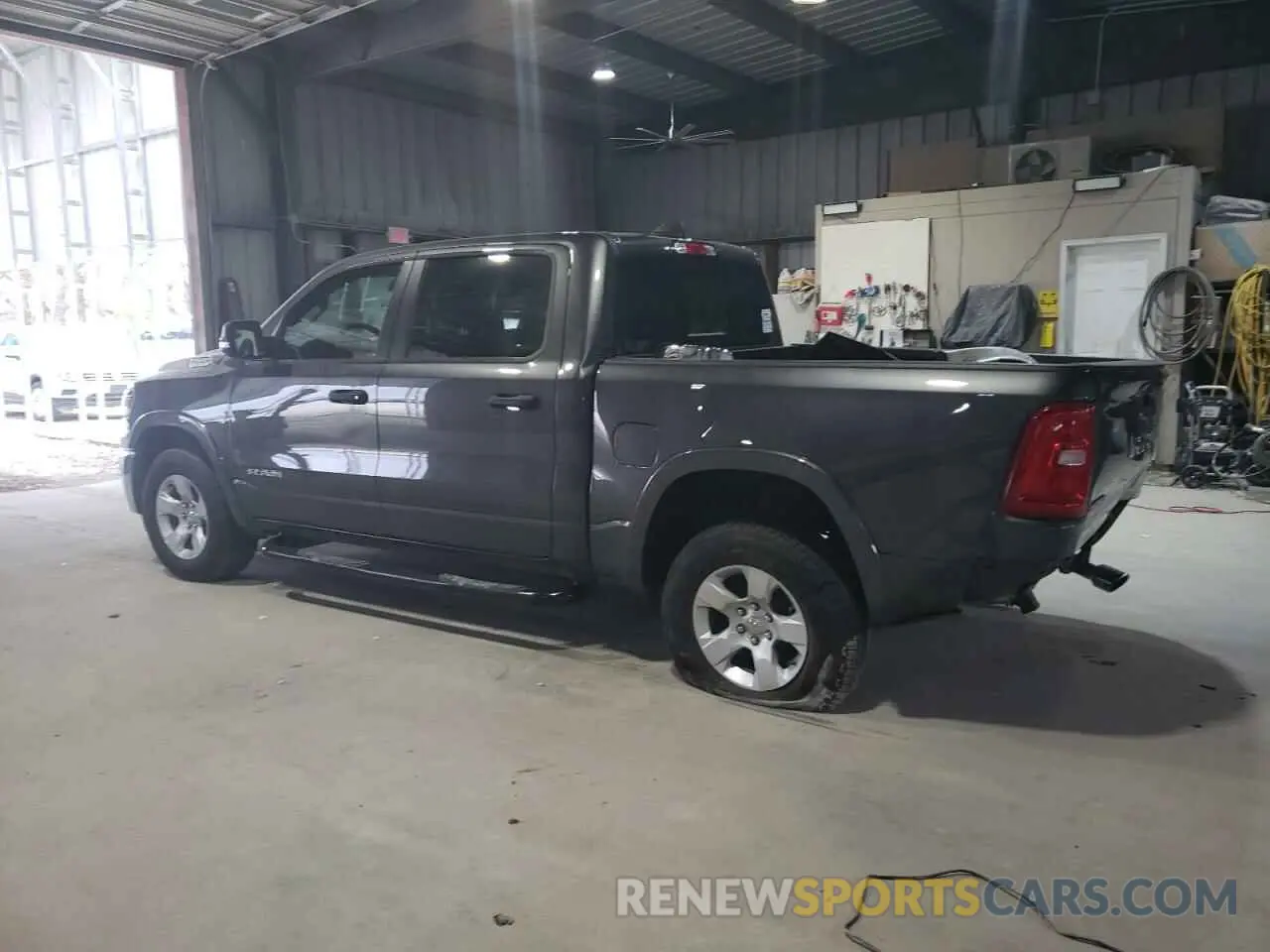 2 Photograph of a damaged car 1C6SRFFP3SN636561 RAM 1500 2025