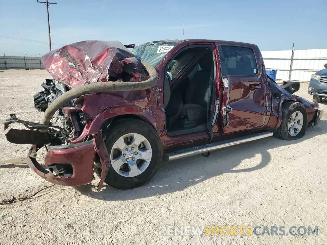 1 Photograph of a damaged car 1C6SRFFP4SN535836 RAM 1500 2025