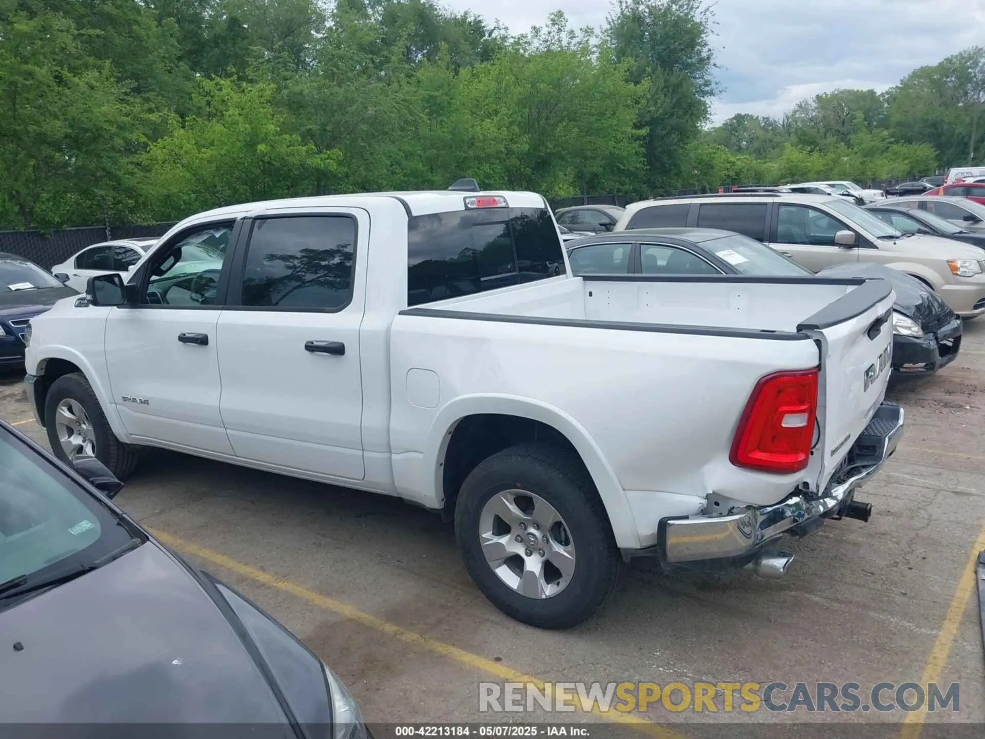 14 Photograph of a damaged car 1C6SRFFP4SN562194 RAM 1500 2025