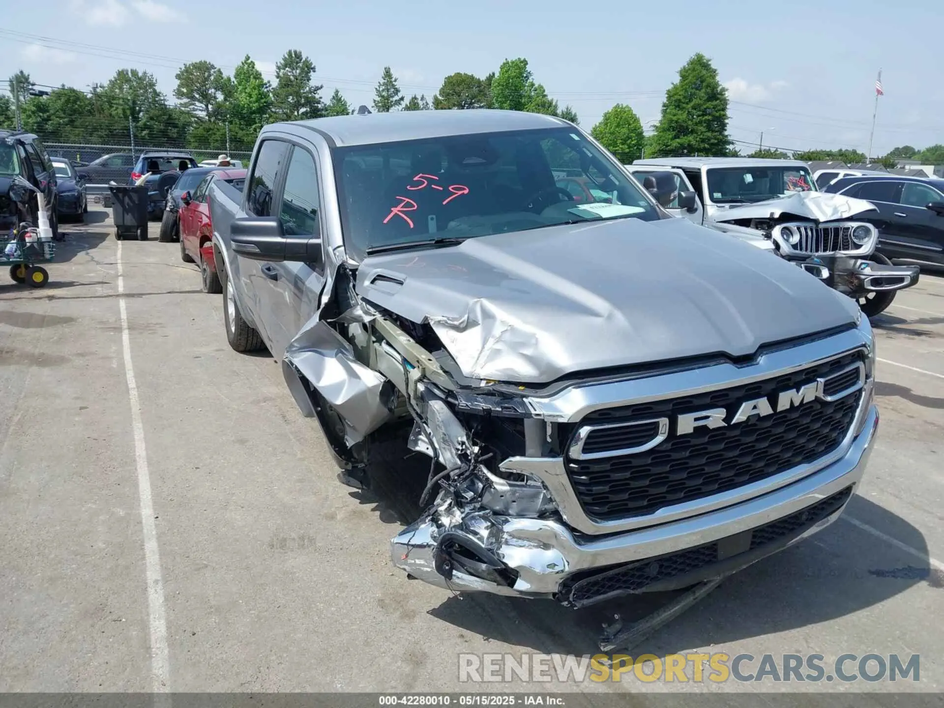 1 Photograph of a damaged car 1C6SRFFP4SN584213 RAM 1500 2025