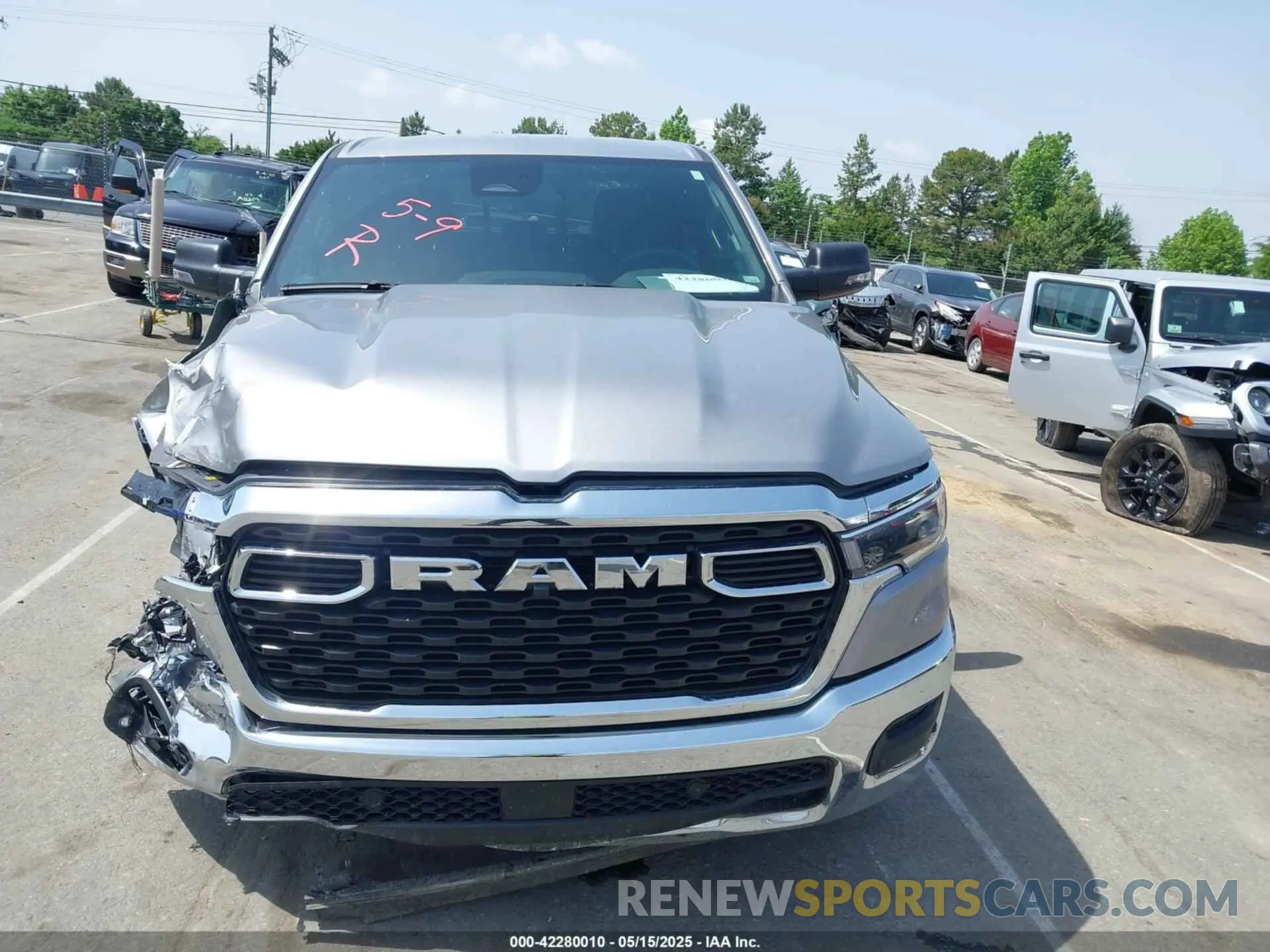 12 Photograph of a damaged car 1C6SRFFP4SN584213 RAM 1500 2025