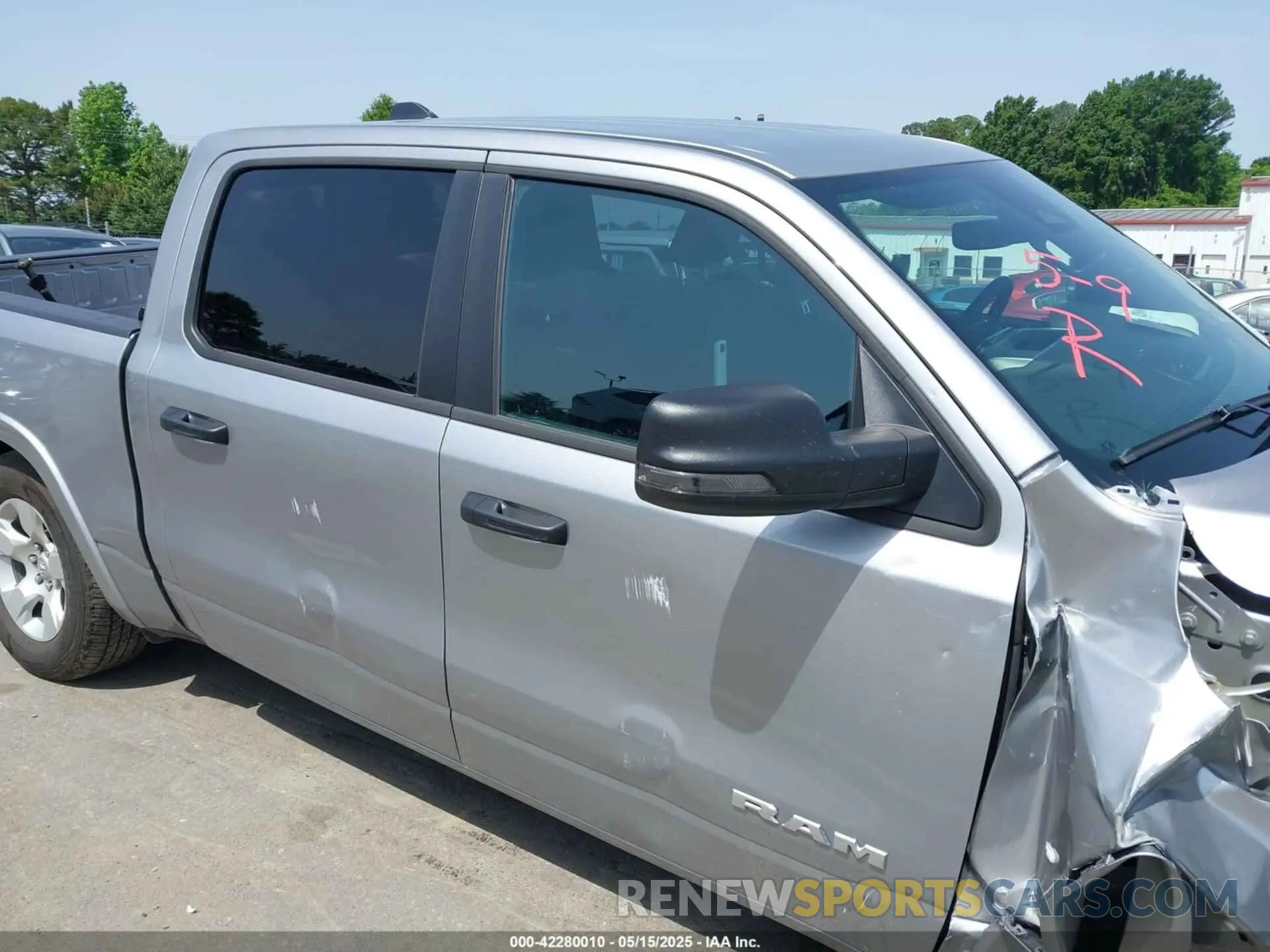 13 Photograph of a damaged car 1C6SRFFP4SN584213 RAM 1500 2025