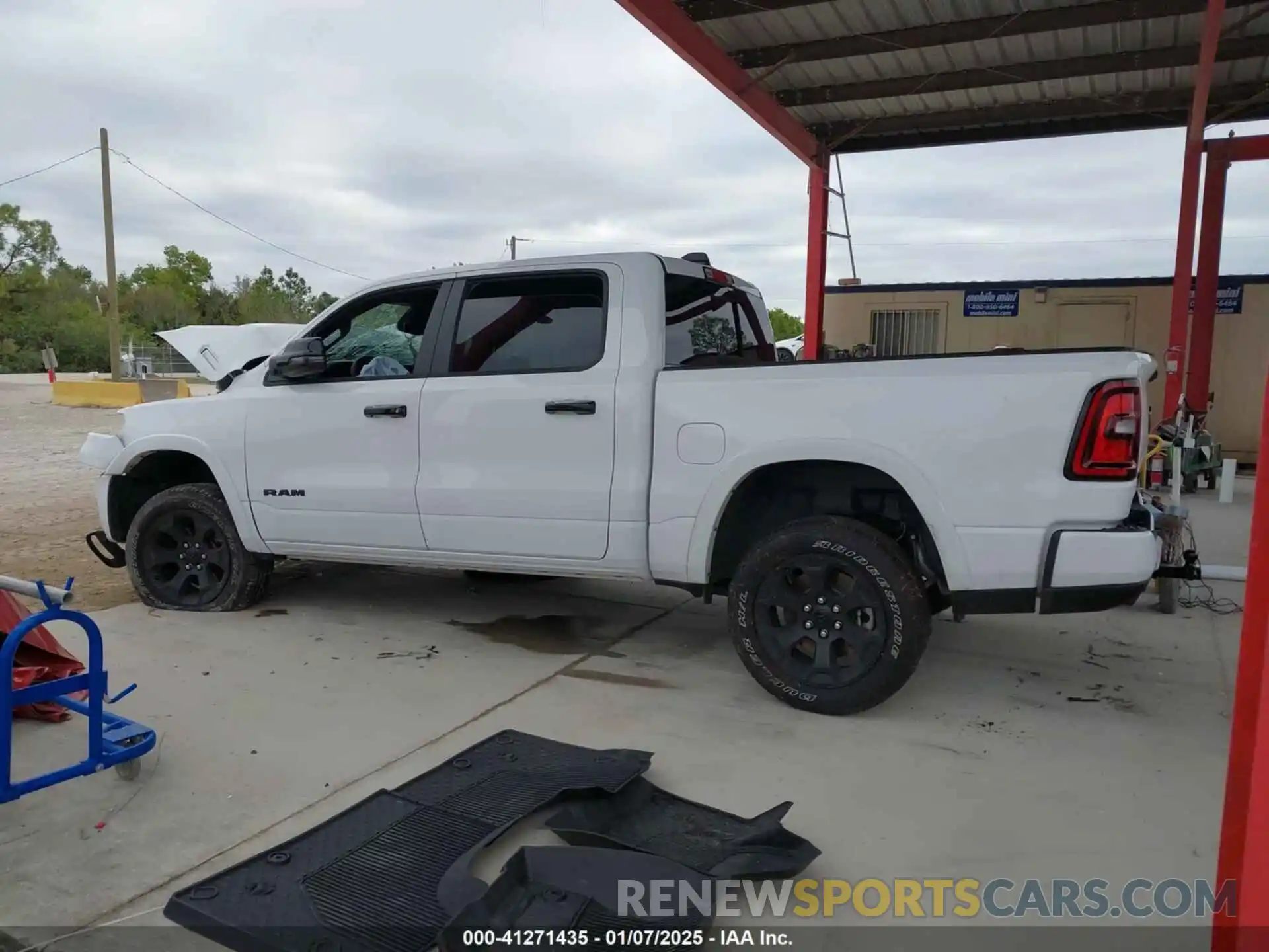 14 Photograph of a damaged car 1C6SRFFP7SN564294 RAM 1500 2025