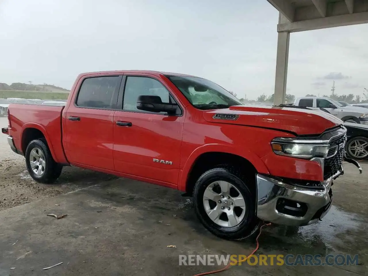4 Photograph of a damaged car 1C6SRFFP7SN581838 RAM 1500 2025