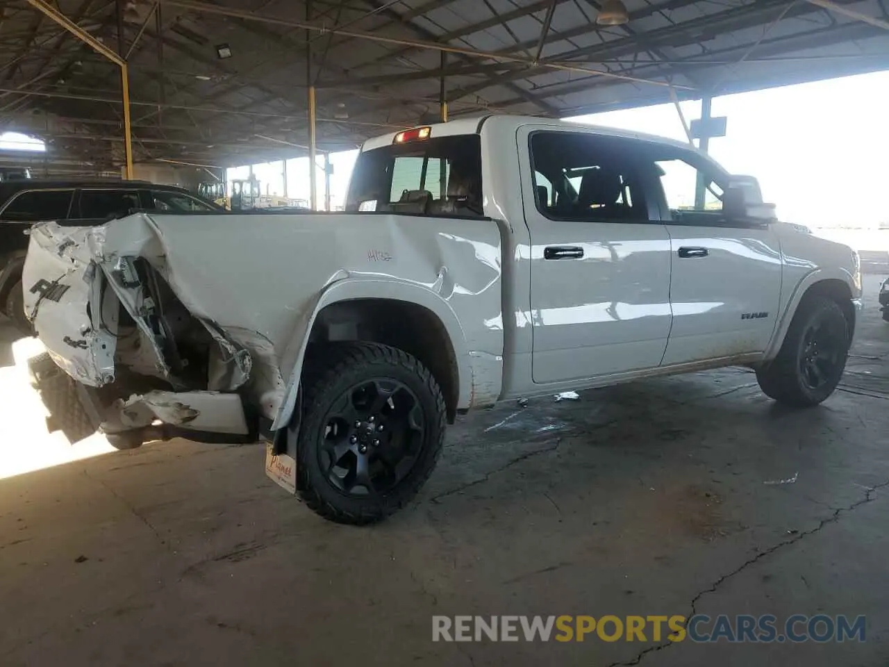 3 Photograph of a damaged car 1C6SRFFP8SN618833 RAM 1500 2025