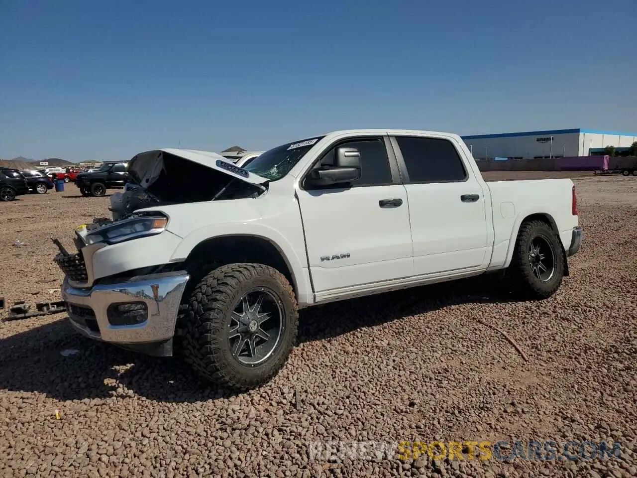 1 Photograph of a damaged car 1C6SRFFP8SN656238 RAM 1500 2025