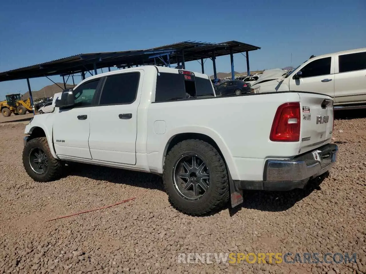 2 Photograph of a damaged car 1C6SRFFP8SN656238 RAM 1500 2025