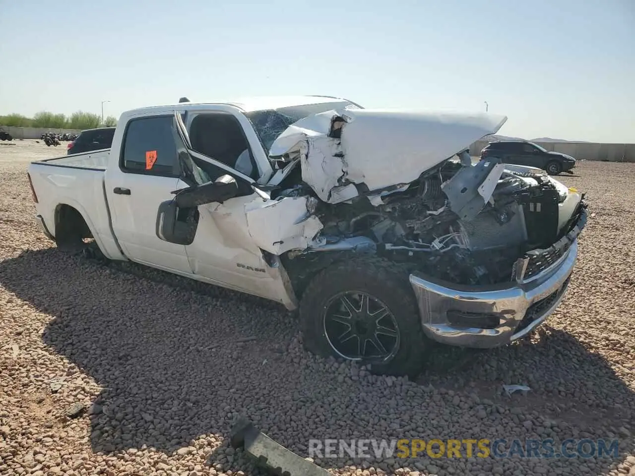 4 Photograph of a damaged car 1C6SRFFP8SN656238 RAM 1500 2025