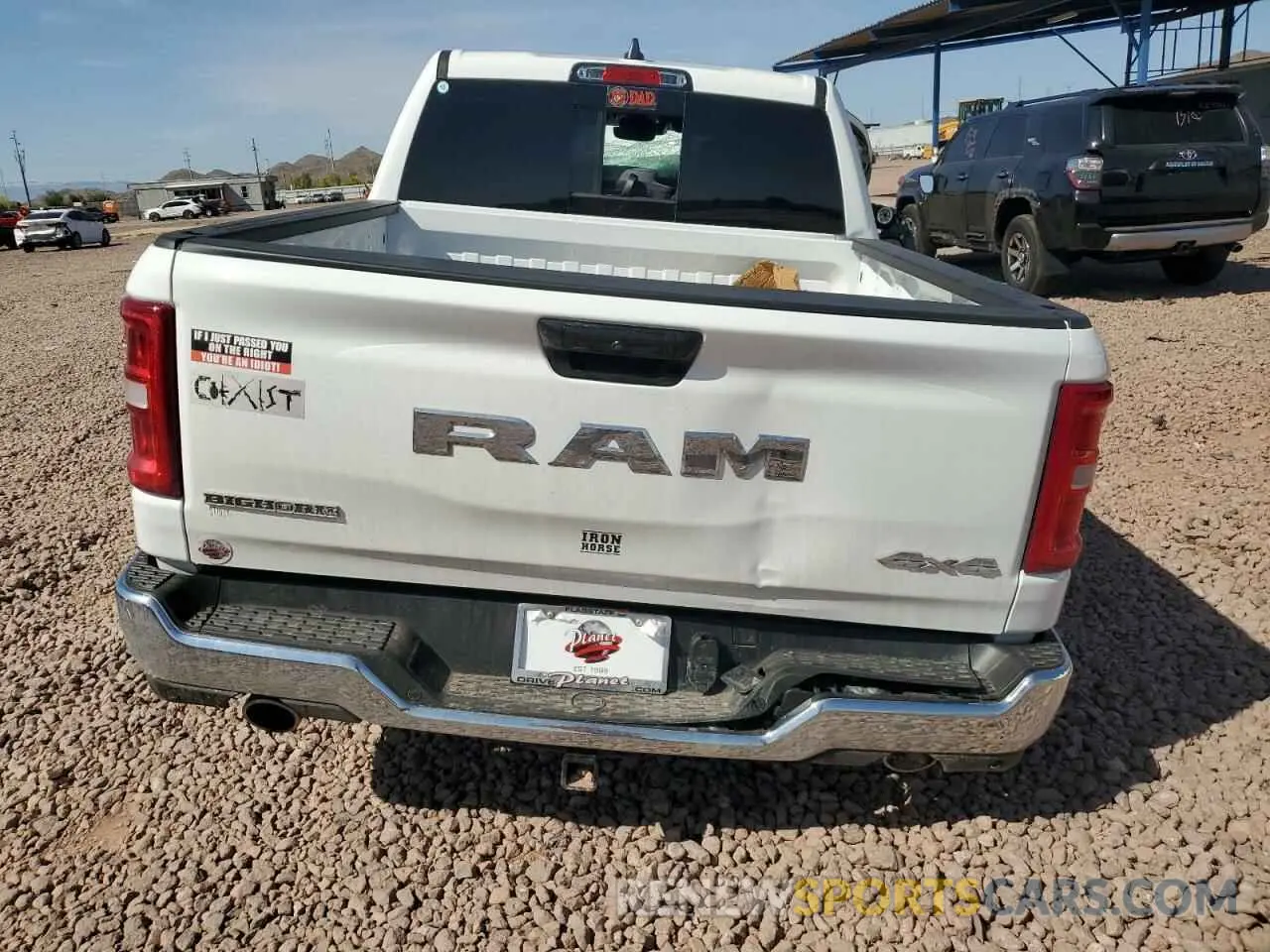 6 Photograph of a damaged car 1C6SRFFP8SN656238 RAM 1500 2025