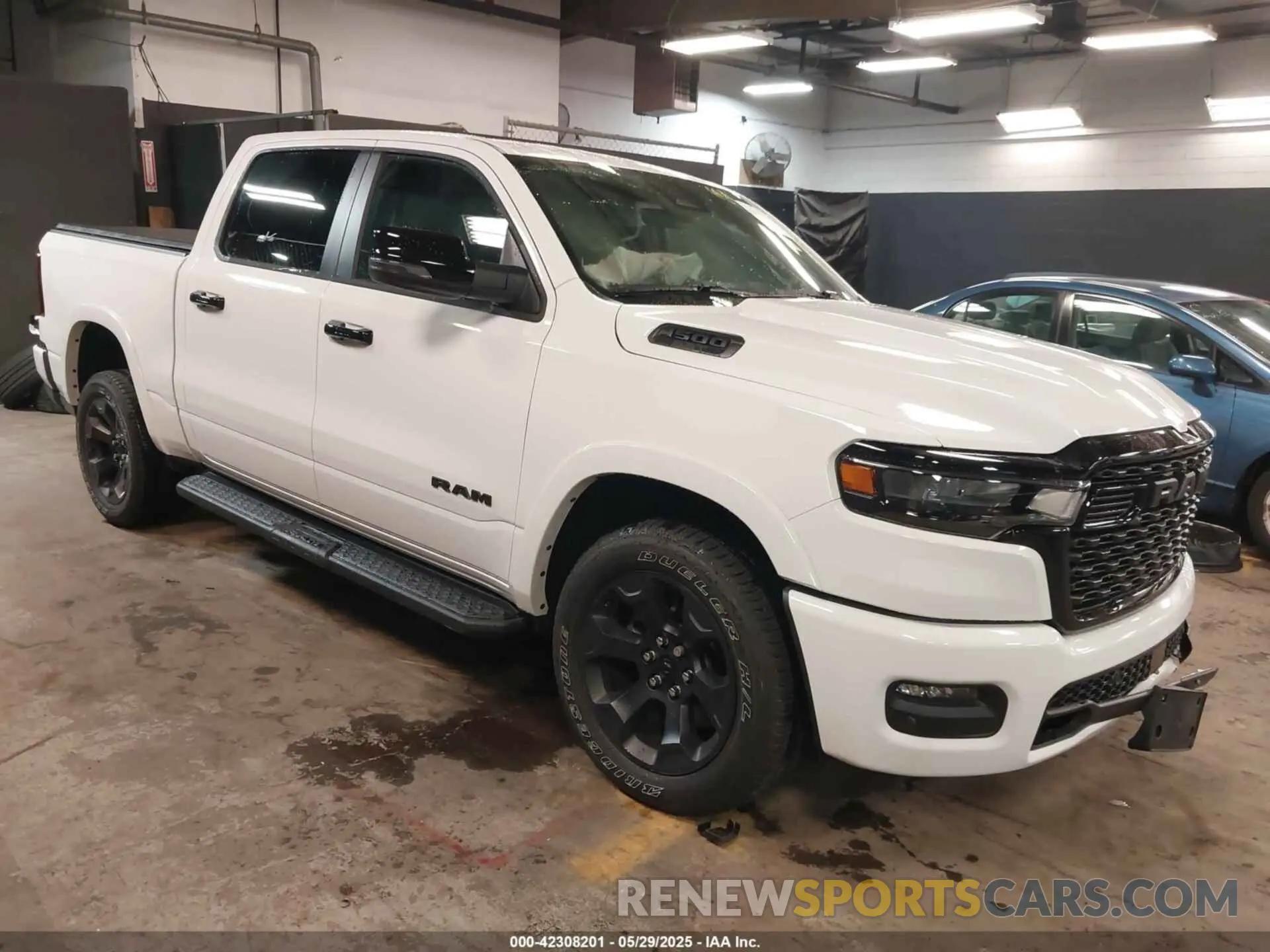 1 Photograph of a damaged car 1C6SRFFP9SN703082 RAM 1500 2025