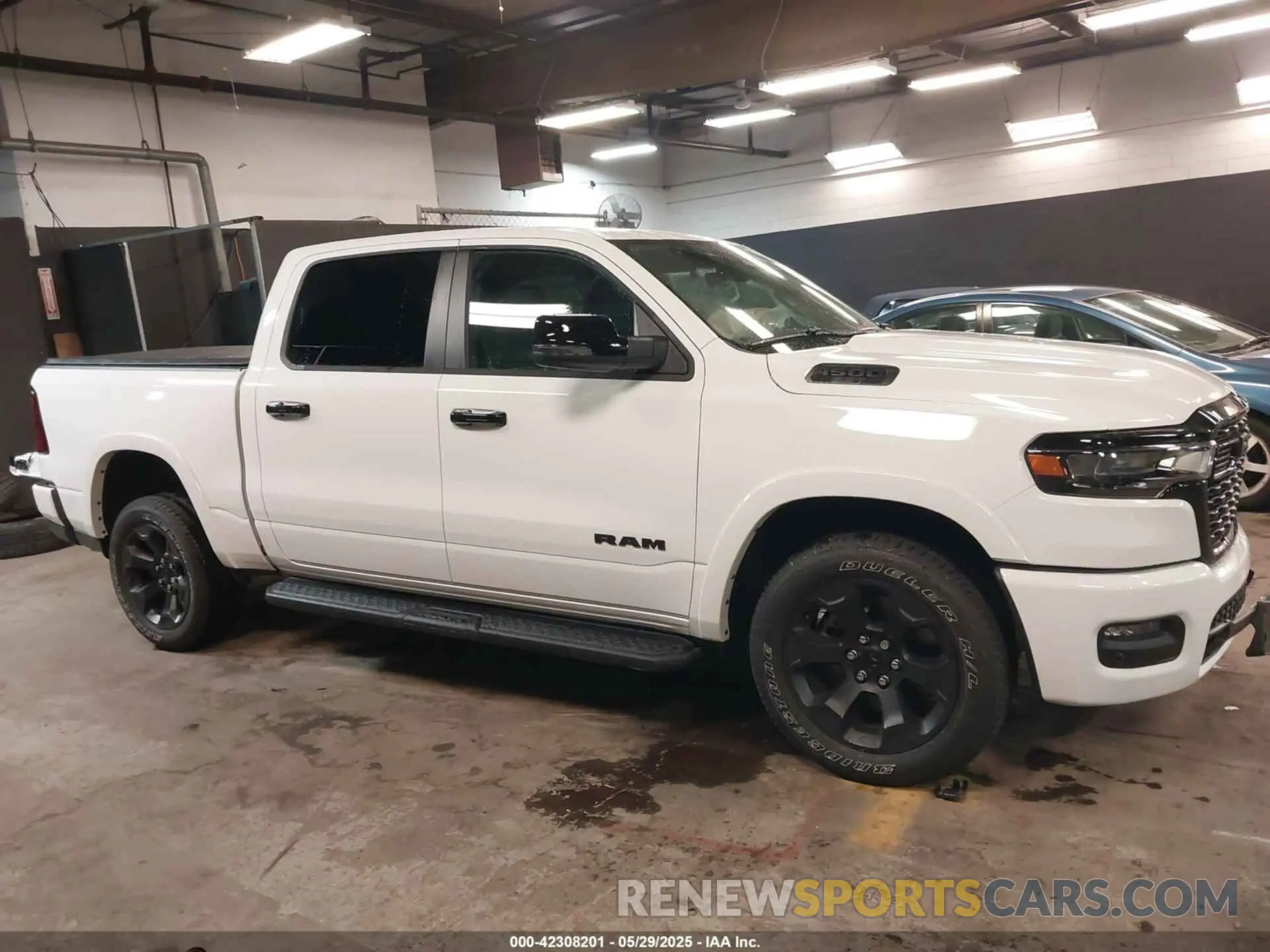 14 Photograph of a damaged car 1C6SRFFP9SN703082 RAM 1500 2025