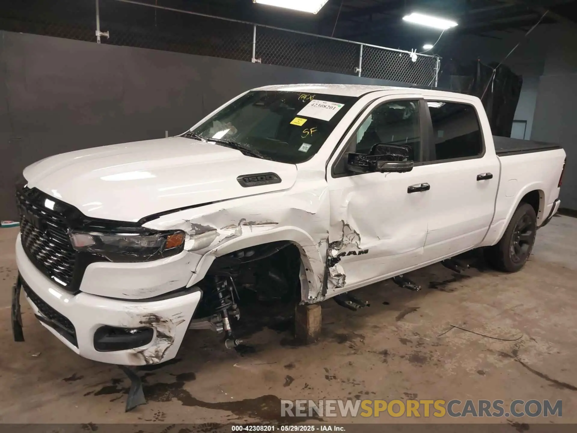 6 Photograph of a damaged car 1C6SRFFP9SN703082 RAM 1500 2025