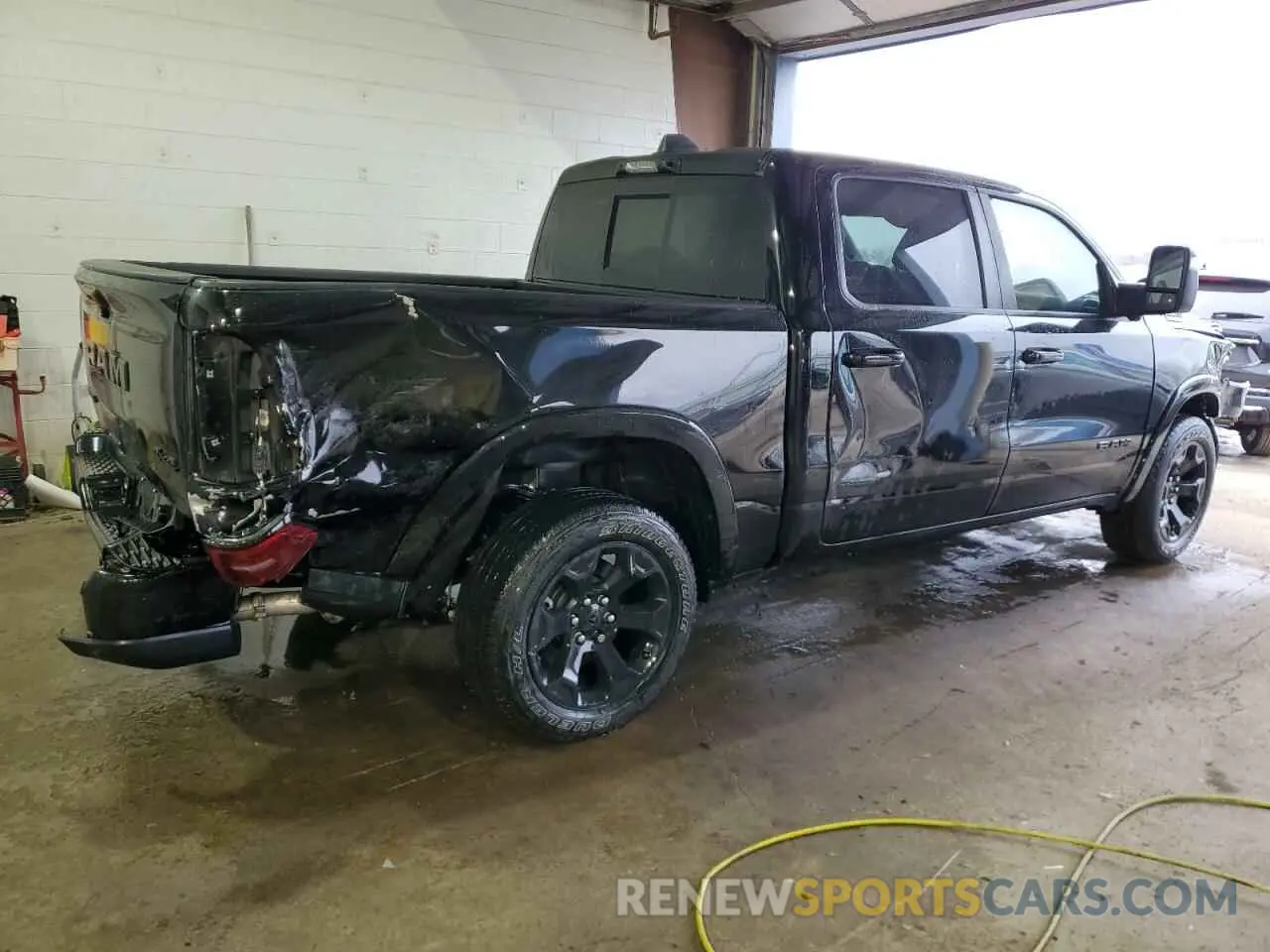 3 Photograph of a damaged car 1C6SRFFPXSN511220 RAM 1500 2025