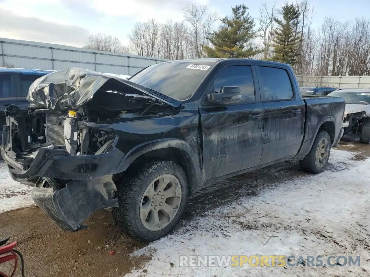 1 Photograph of a damaged car 1C6SRFFPXSN513534 RAM 1500 2025