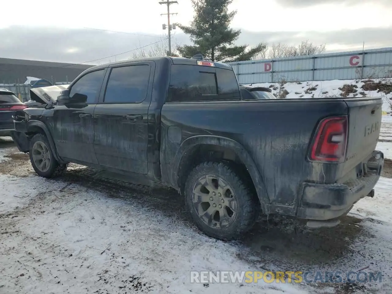2 Photograph of a damaged car 1C6SRFFPXSN513534 RAM 1500 2025