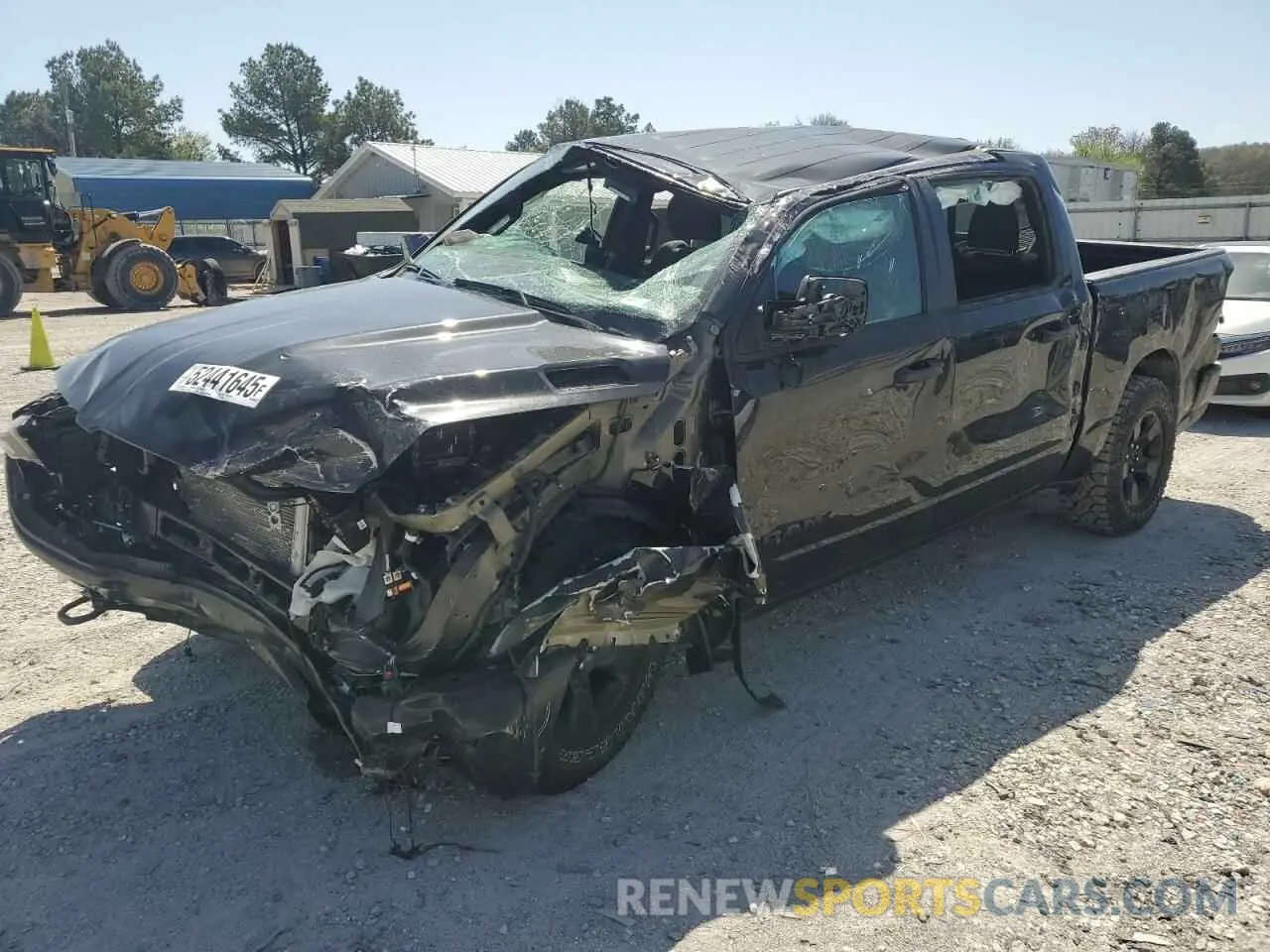 1 Photograph of a damaged car 1C6SRFGP1SN607610 RAM 1500 2025