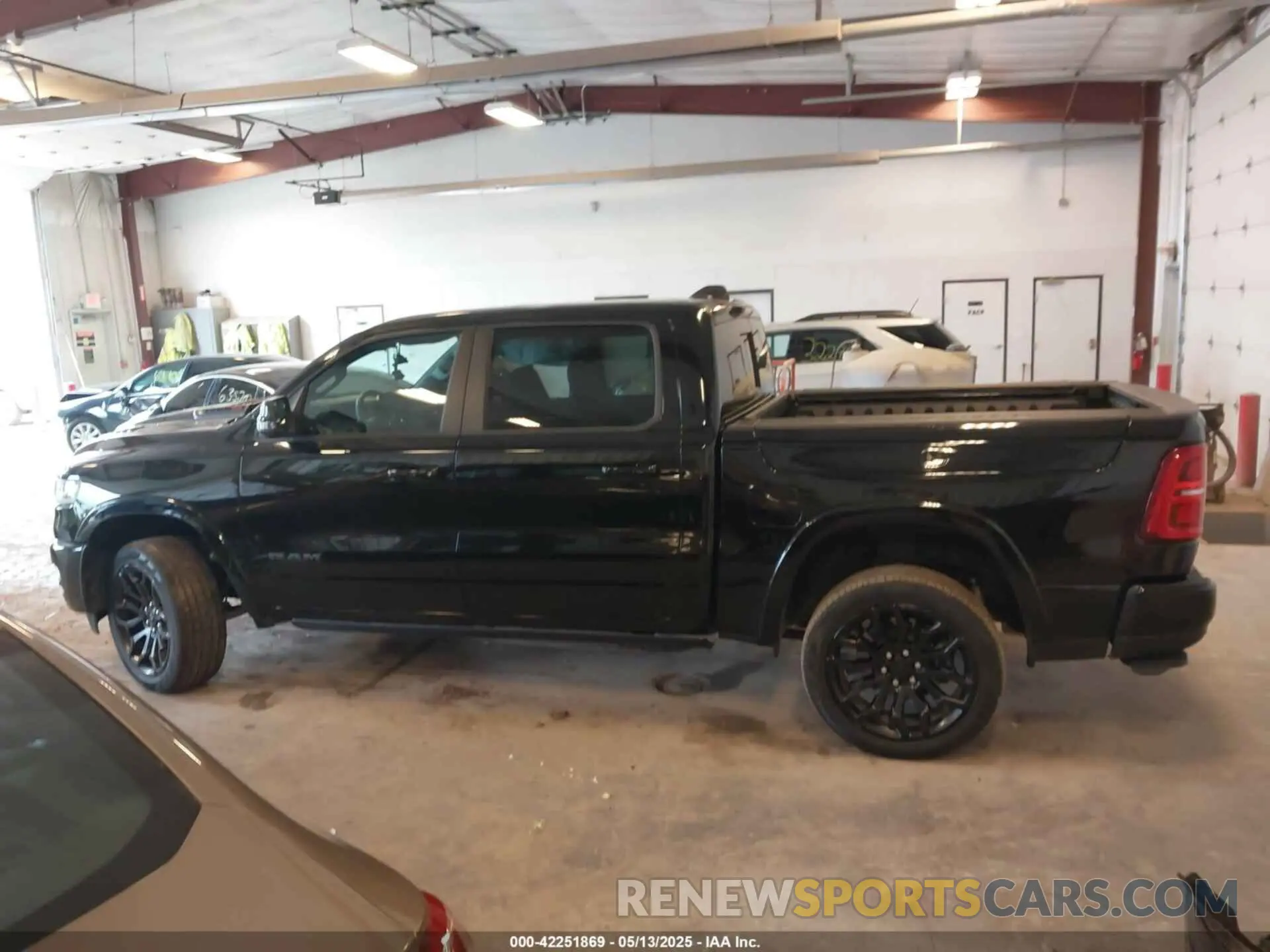 14 Photograph of a damaged car 1C6SRFHP0SN569429 RAM 1500 2025