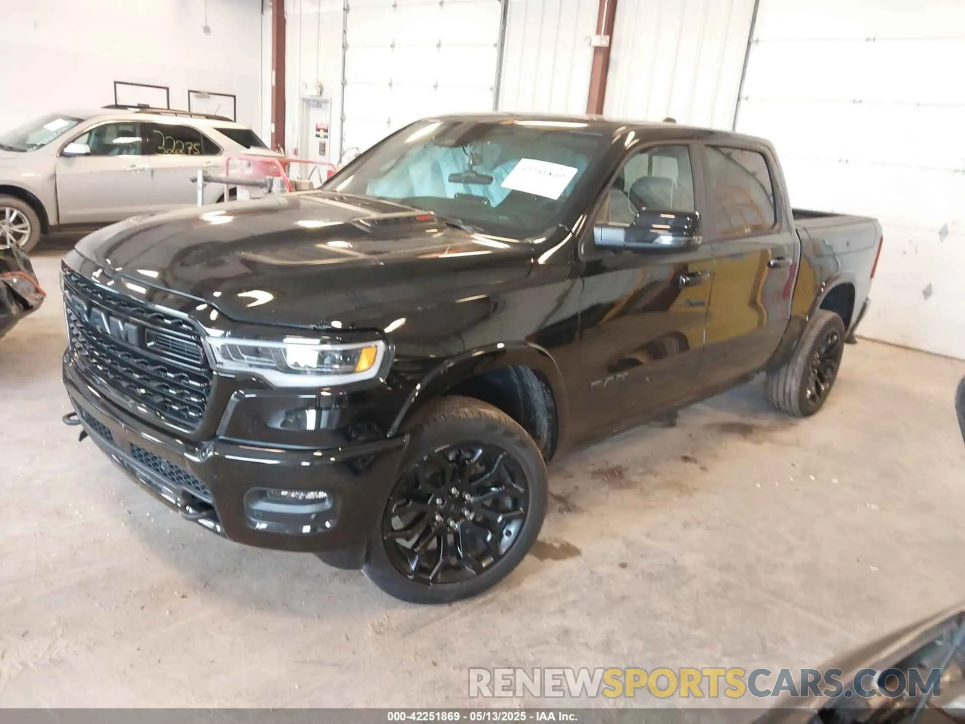 2 Photograph of a damaged car 1C6SRFHP0SN569429 RAM 1500 2025