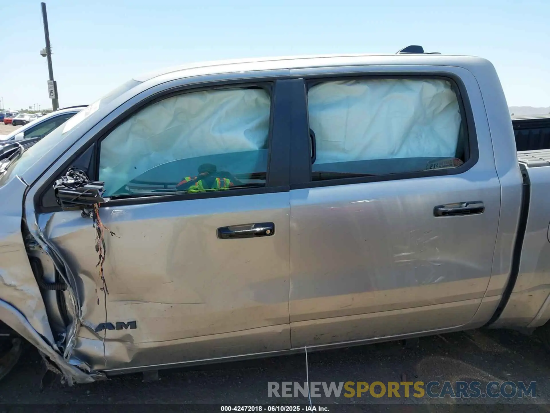 14 Photograph of a damaged car 1C6SRFHP8SN635113 RAM 1500 2025