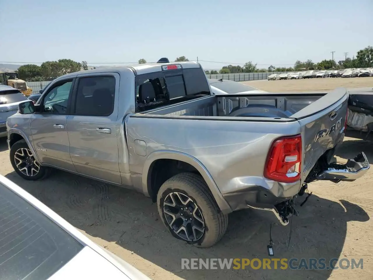 2 Photograph of a damaged car 1C6SRFJP0SN583552 RAM 1500 2025