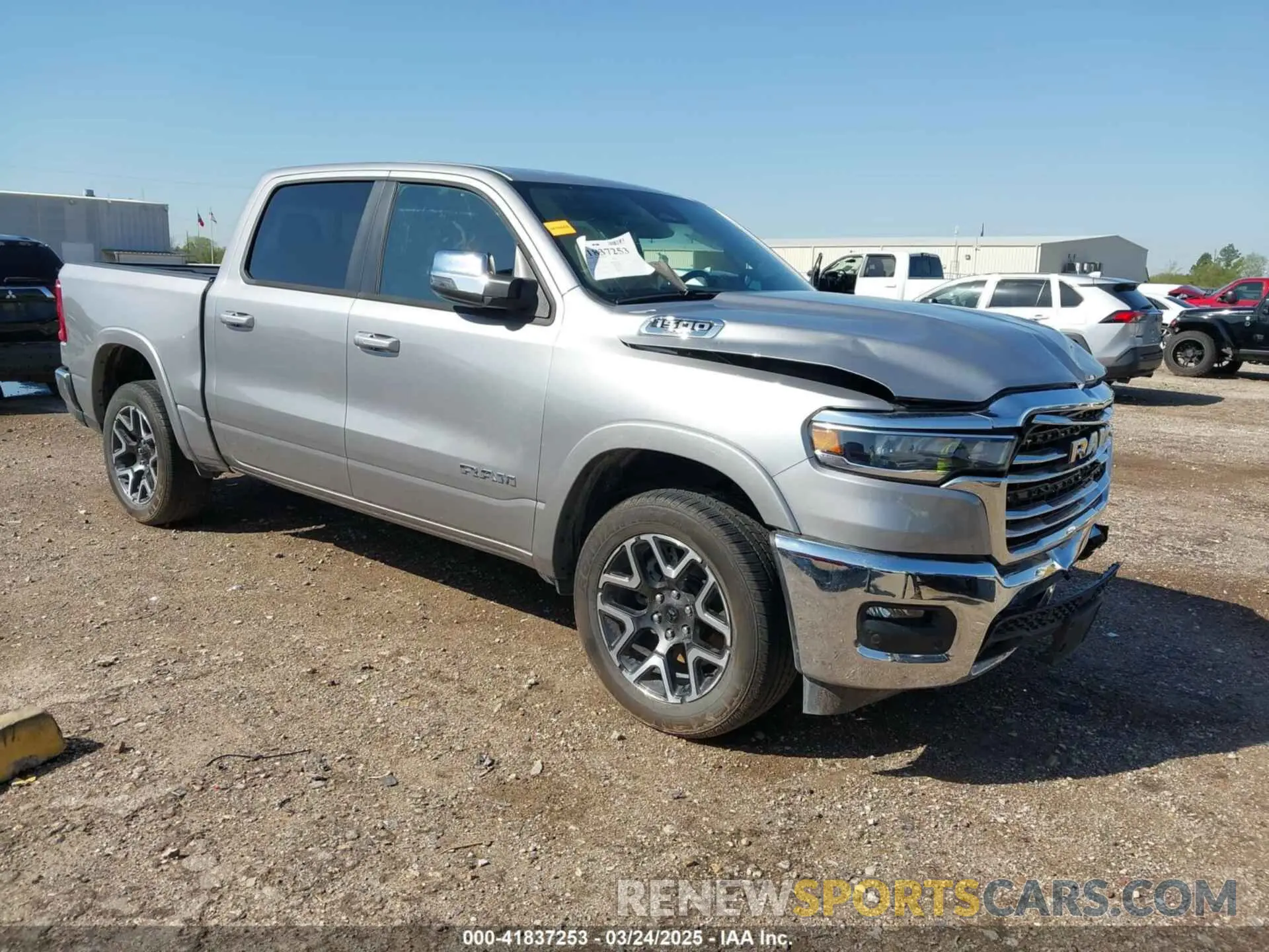 1 Photograph of a damaged car 1C6SRFJP0SN610331 RAM 1500 2025