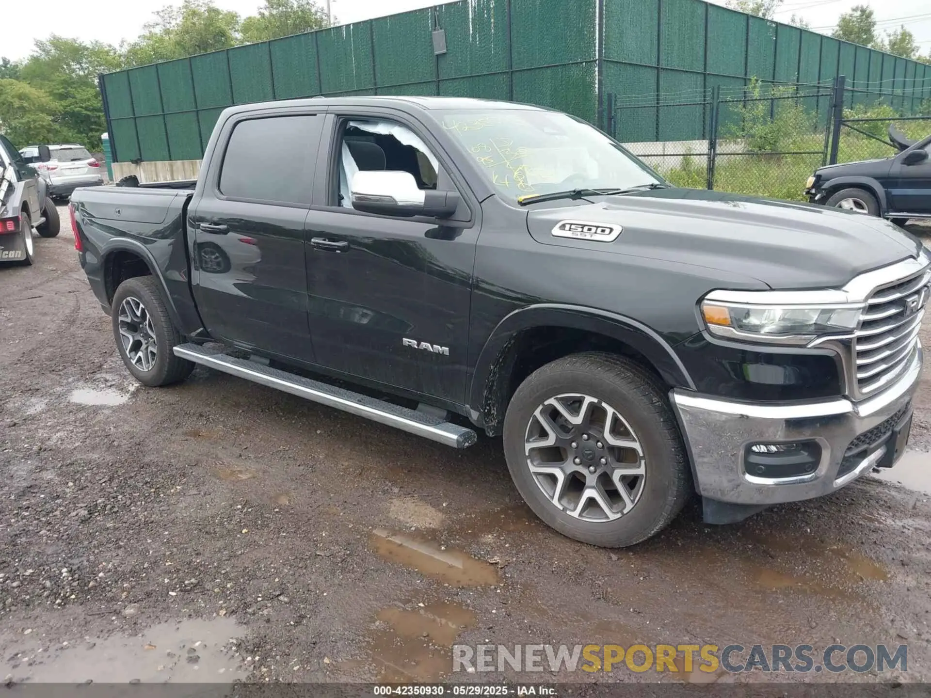 1 Photograph of a damaged car 1C6SRFJP2SN514524 RAM 1500 2025