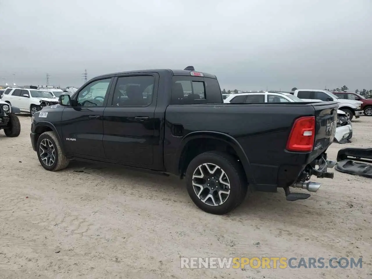 2 Photograph of a damaged car 1C6SRFJP5SN593154 RAM 1500 2025