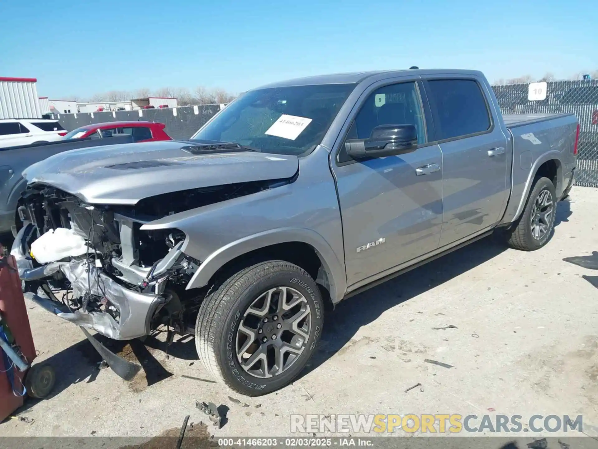 2 Photograph of a damaged car 1C6SRFJP5SN657354 RAM 1500 2025