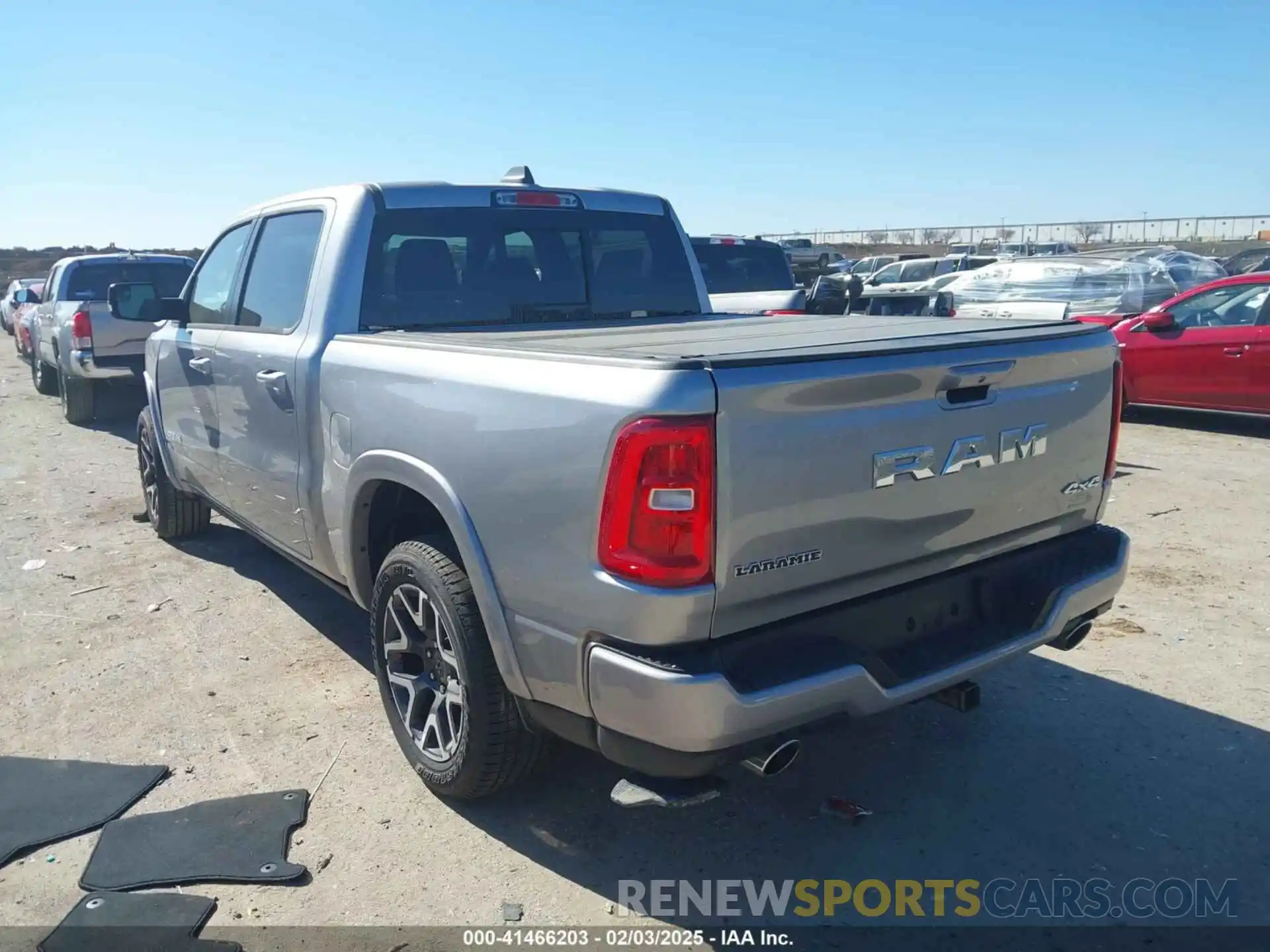 3 Photograph of a damaged car 1C6SRFJP5SN657354 RAM 1500 2025