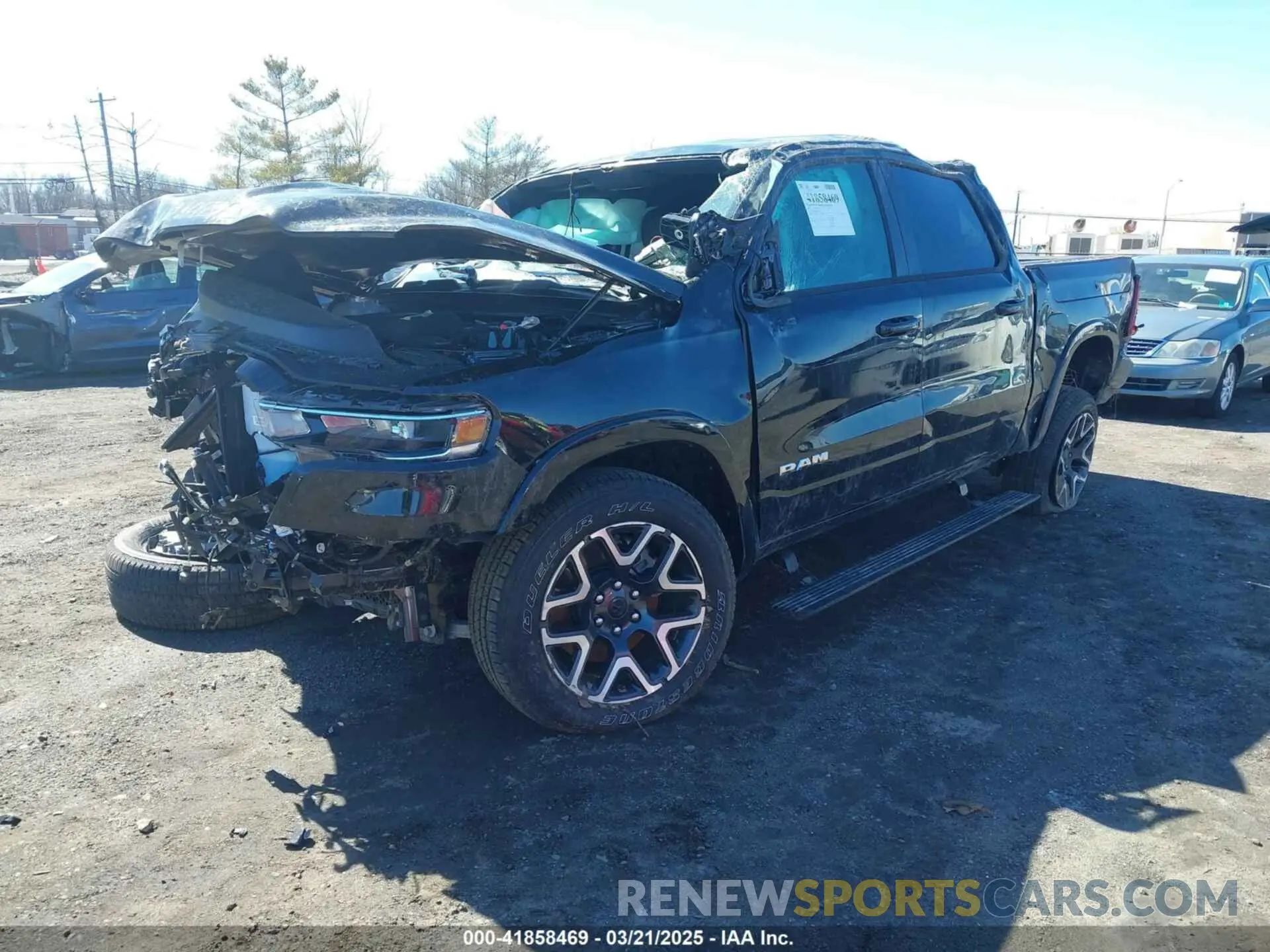 2 Photograph of a damaged car 1C6SRFJP6SN616635 RAM 1500 2025