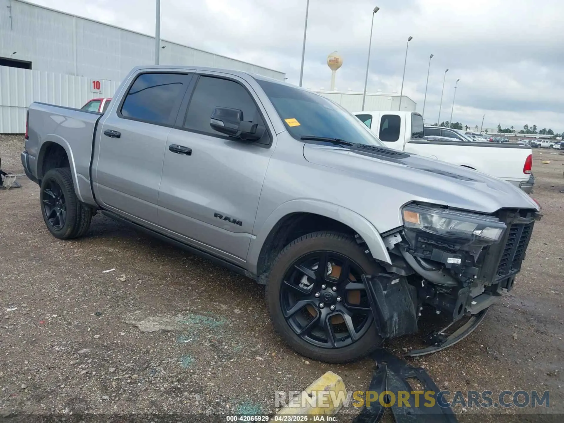 1 Photograph of a damaged car 1C6SRFJP8SN630889 RAM 1500 2025