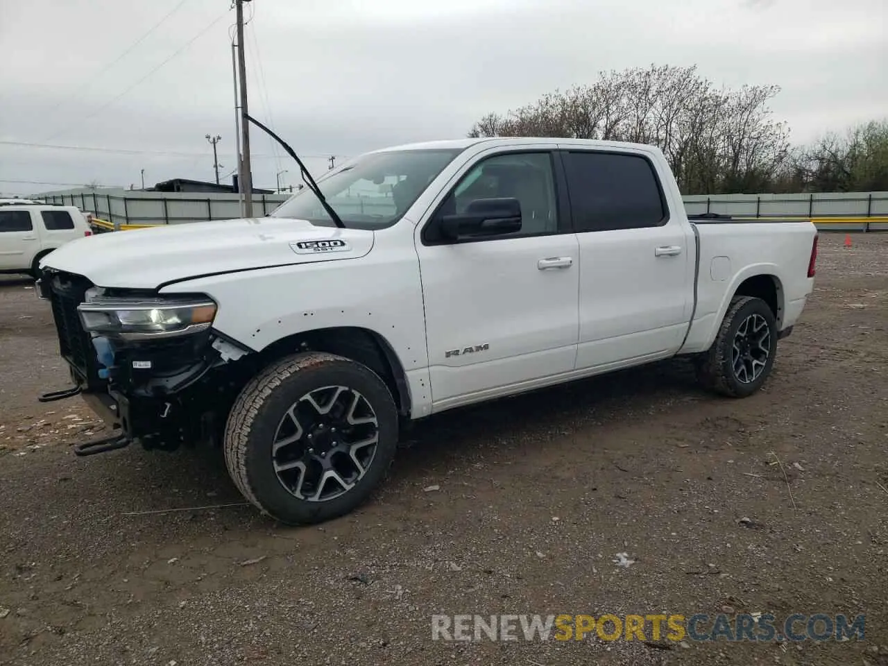 1 Photograph of a damaged car 1C6SRFJP9SN640928 RAM 1500 2025