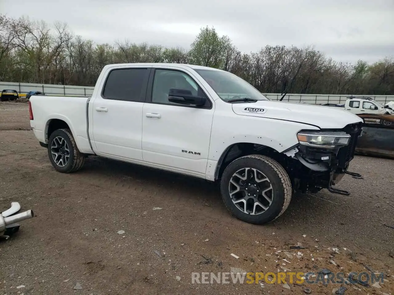 4 Photograph of a damaged car 1C6SRFJP9SN640928 RAM 1500 2025