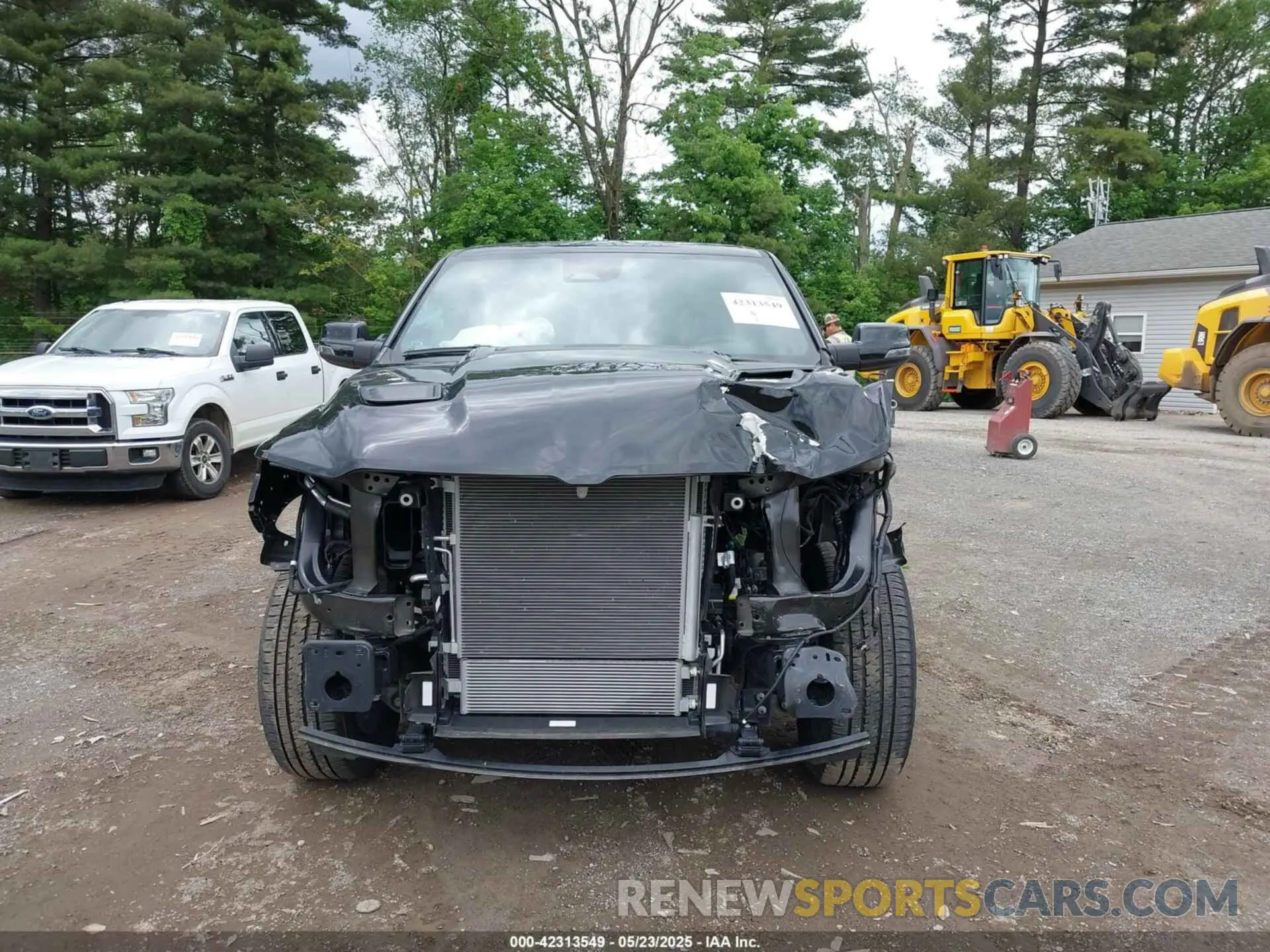 13 Photograph of a damaged car 1C6SRFJPXSN512942 RAM 1500 2025